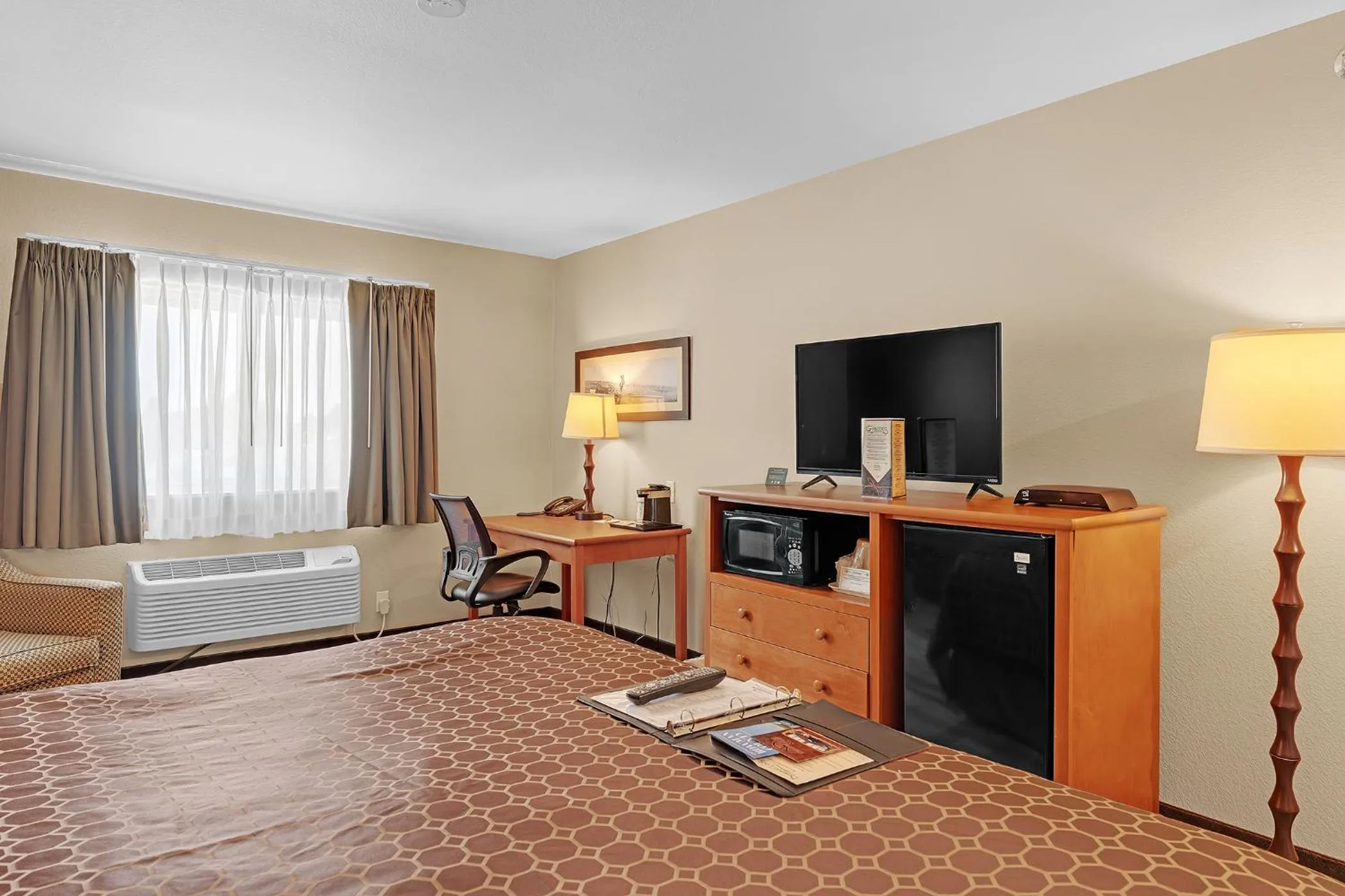 Bed in Bowman Lodge & Convention Center