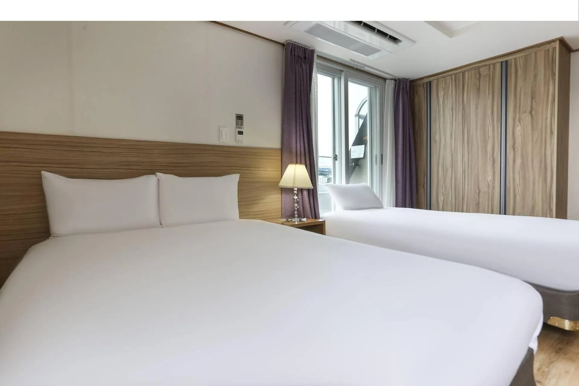 Photo of the whole room, Bed in Hotel Rest Seogwipo