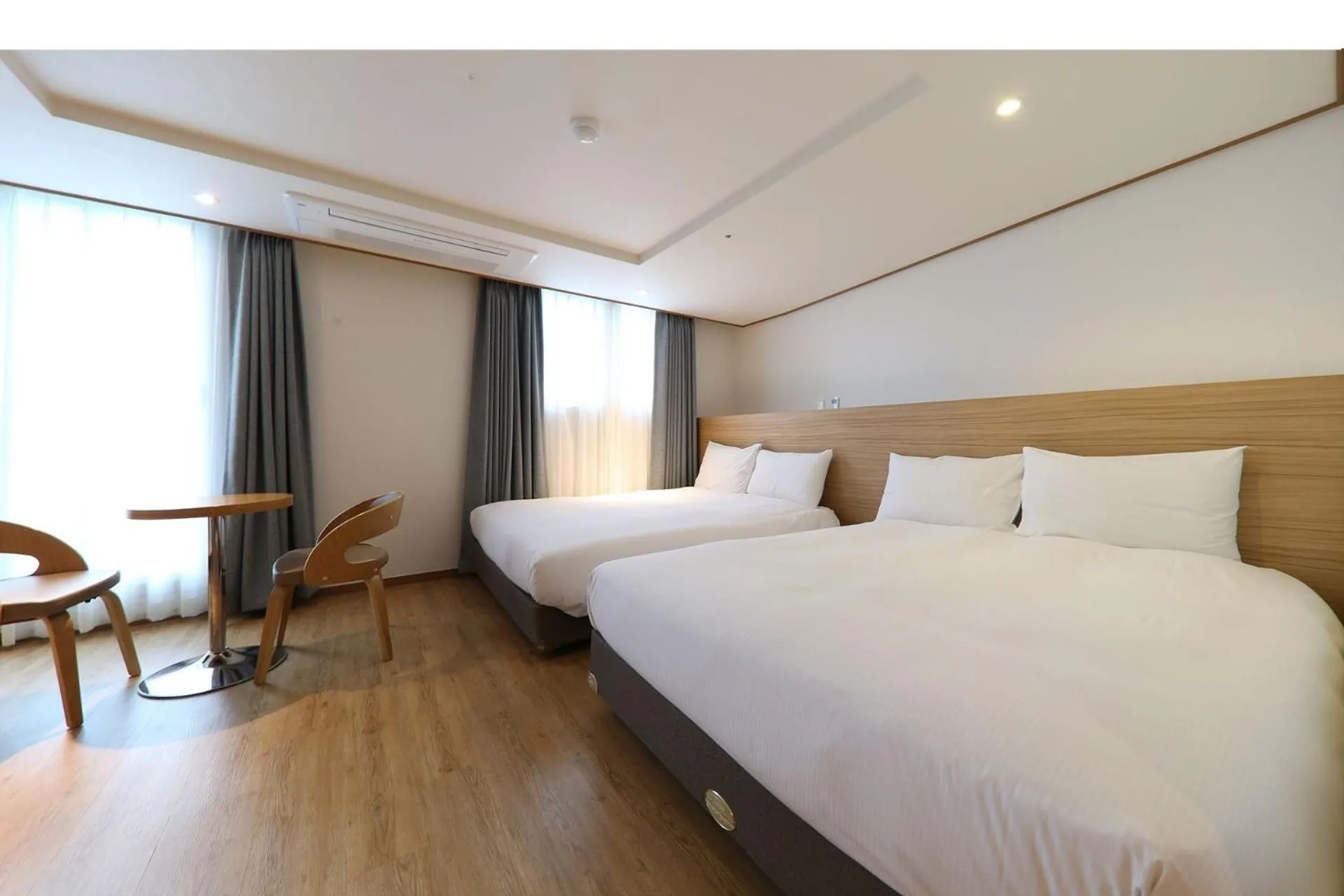 Photo of the whole room, Bed in Hotel Rest Seogwipo