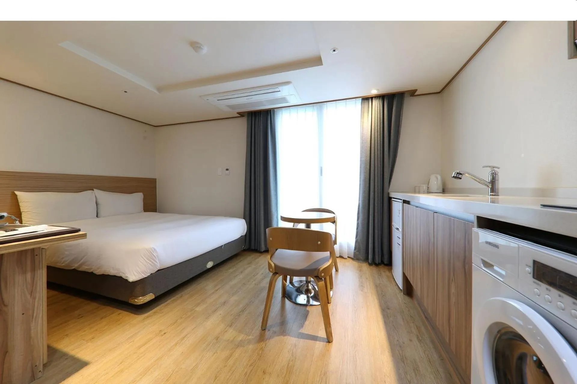 Photo of the whole room, Bed in Hotel Rest Seogwipo