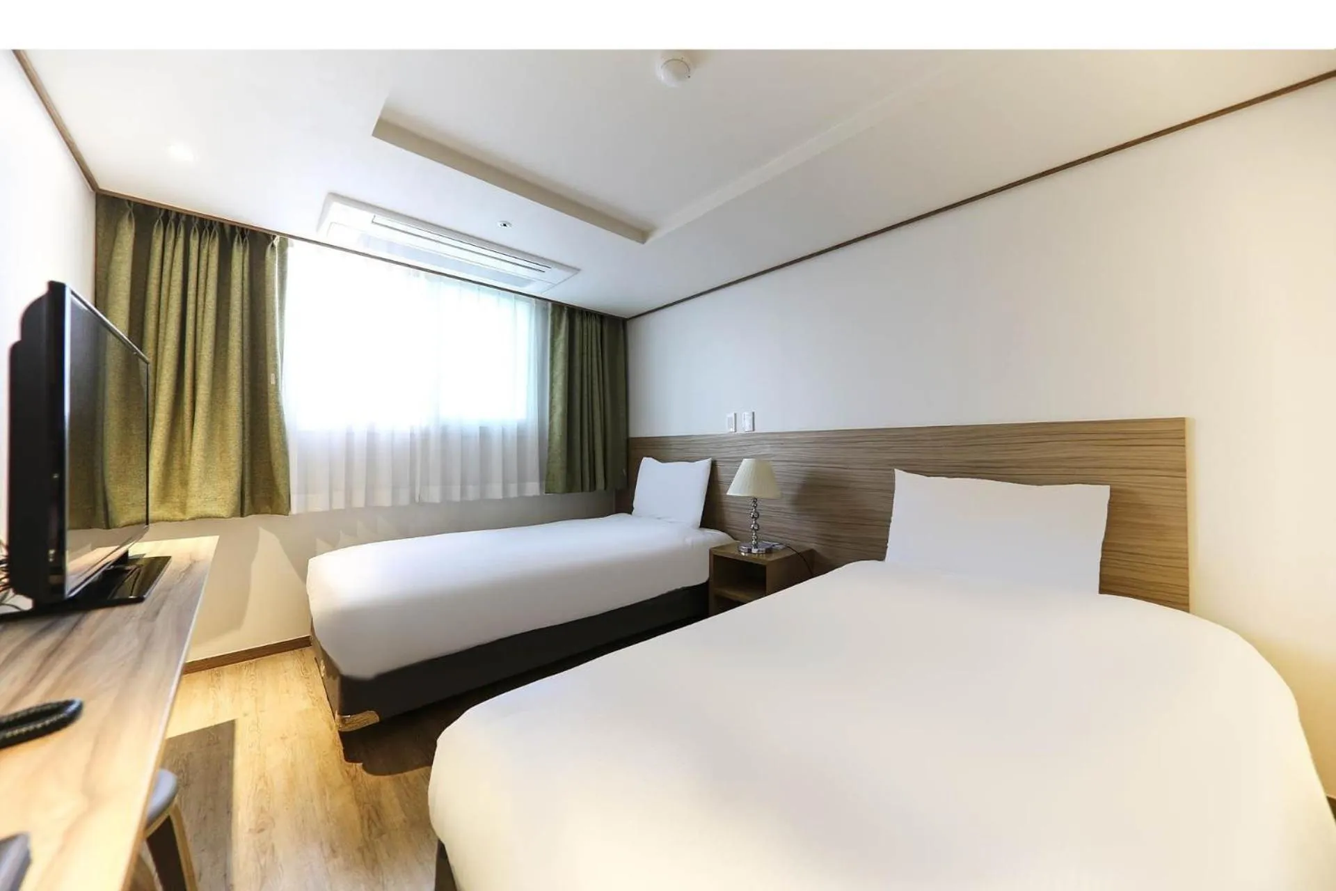 Photo of the whole room, Bed in Hotel Rest Seogwipo