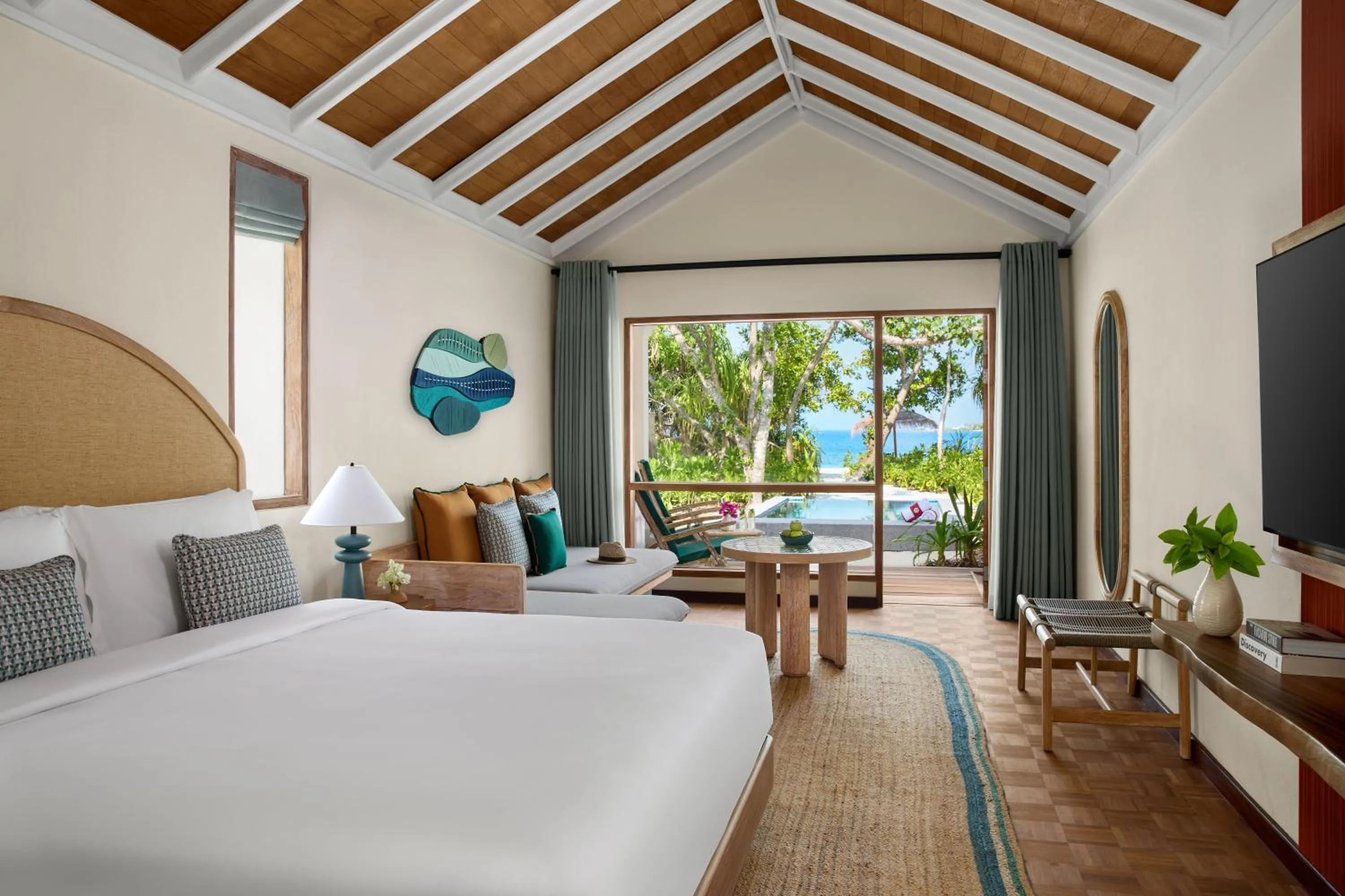 Bed in NH Collection Maldives Reethi Resort