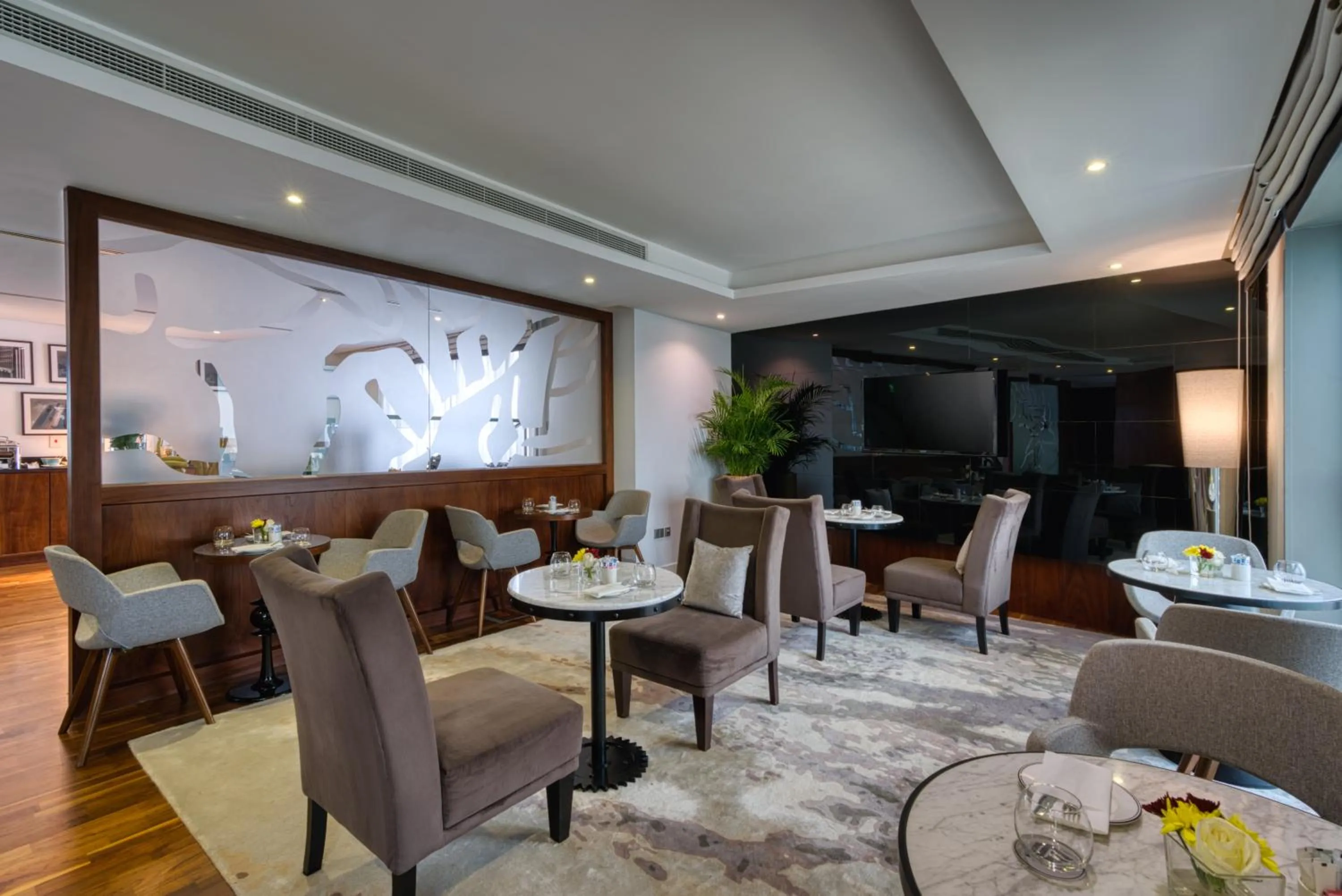 Lounge or bar in The First Collection Dubai Marina