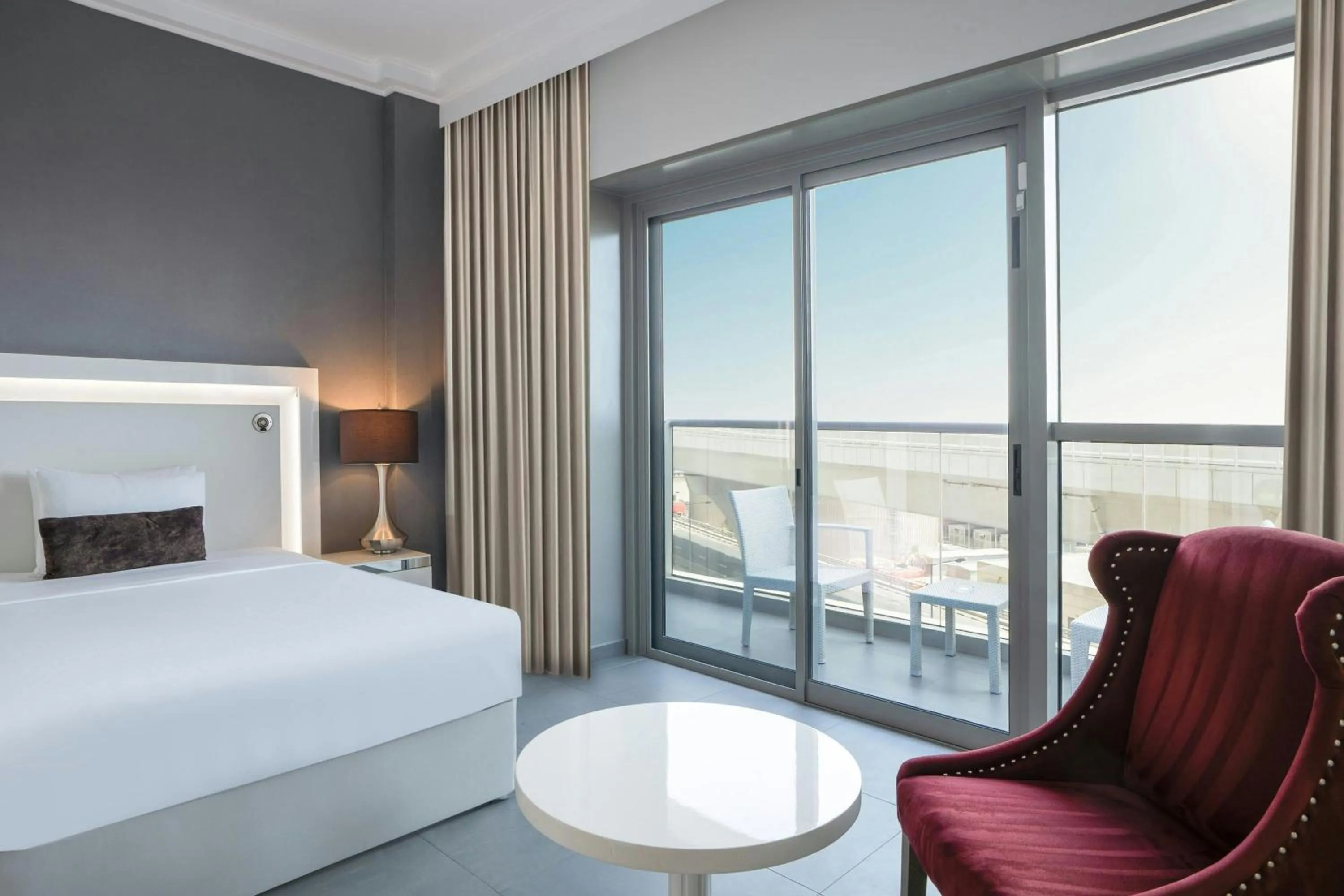 Photo of the whole room, Bed in The First Collection Marina, Dubai, a Tribute Portfolio Hotel