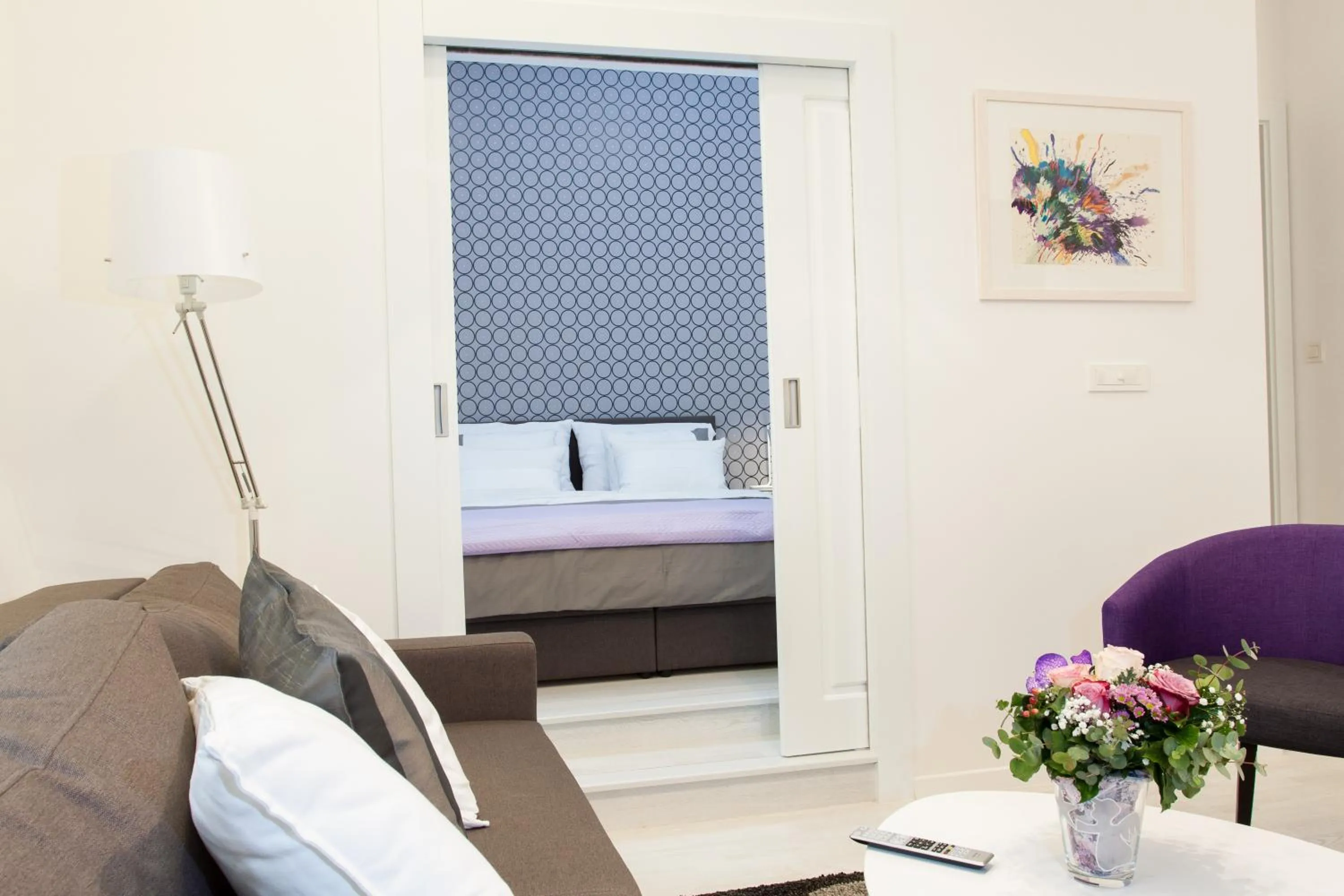 Living room, Bed in Tesla Boutique Apartments & Rooms