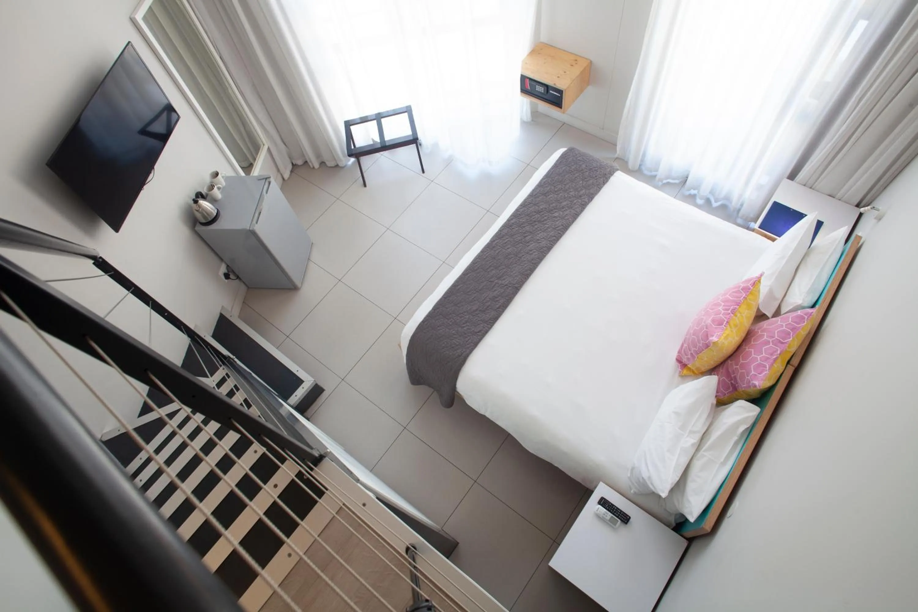 Photo of the whole room, Bed in Mojo Hotel & Market