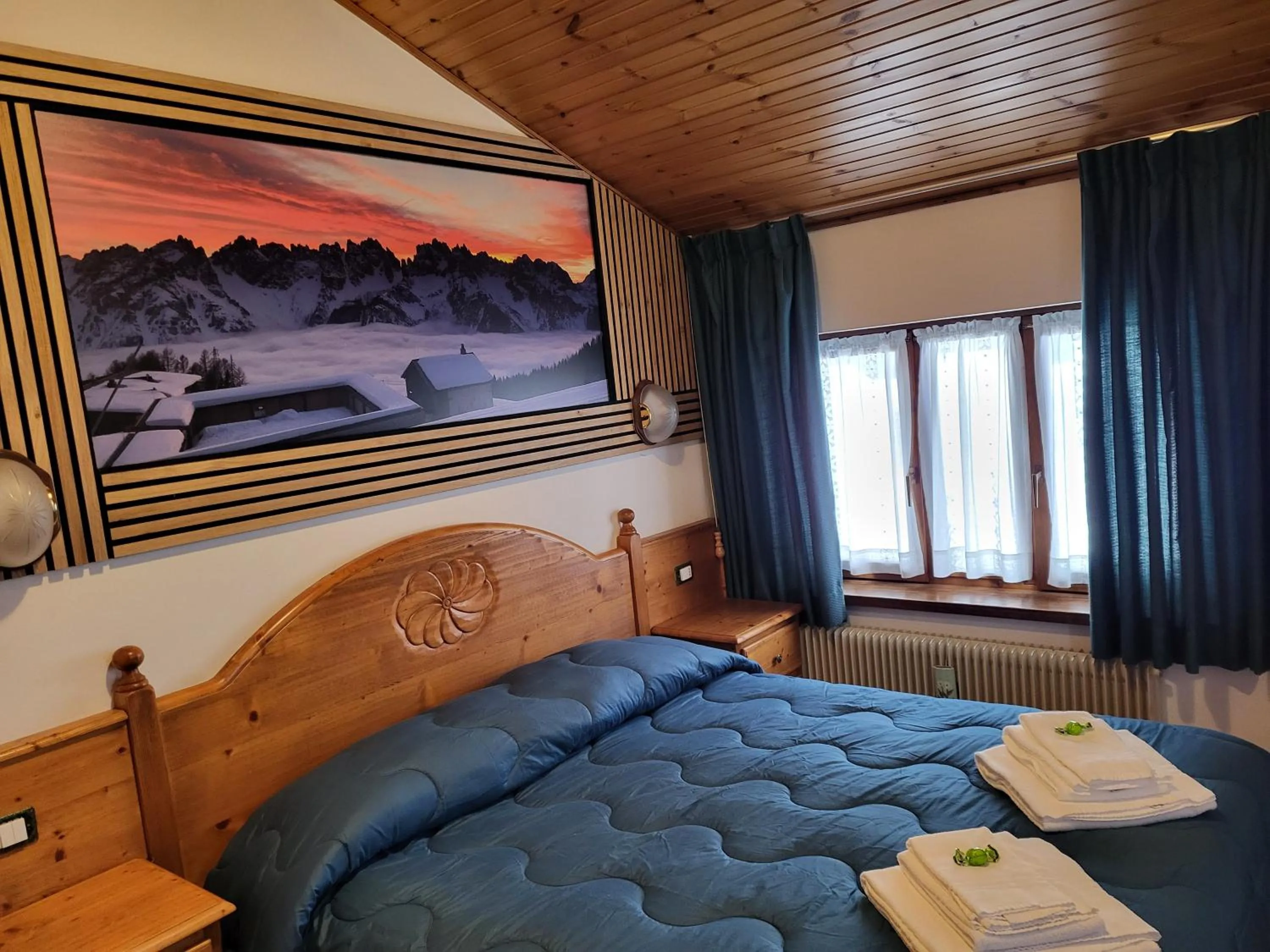Bed in Albergo Meuble Tarandan
