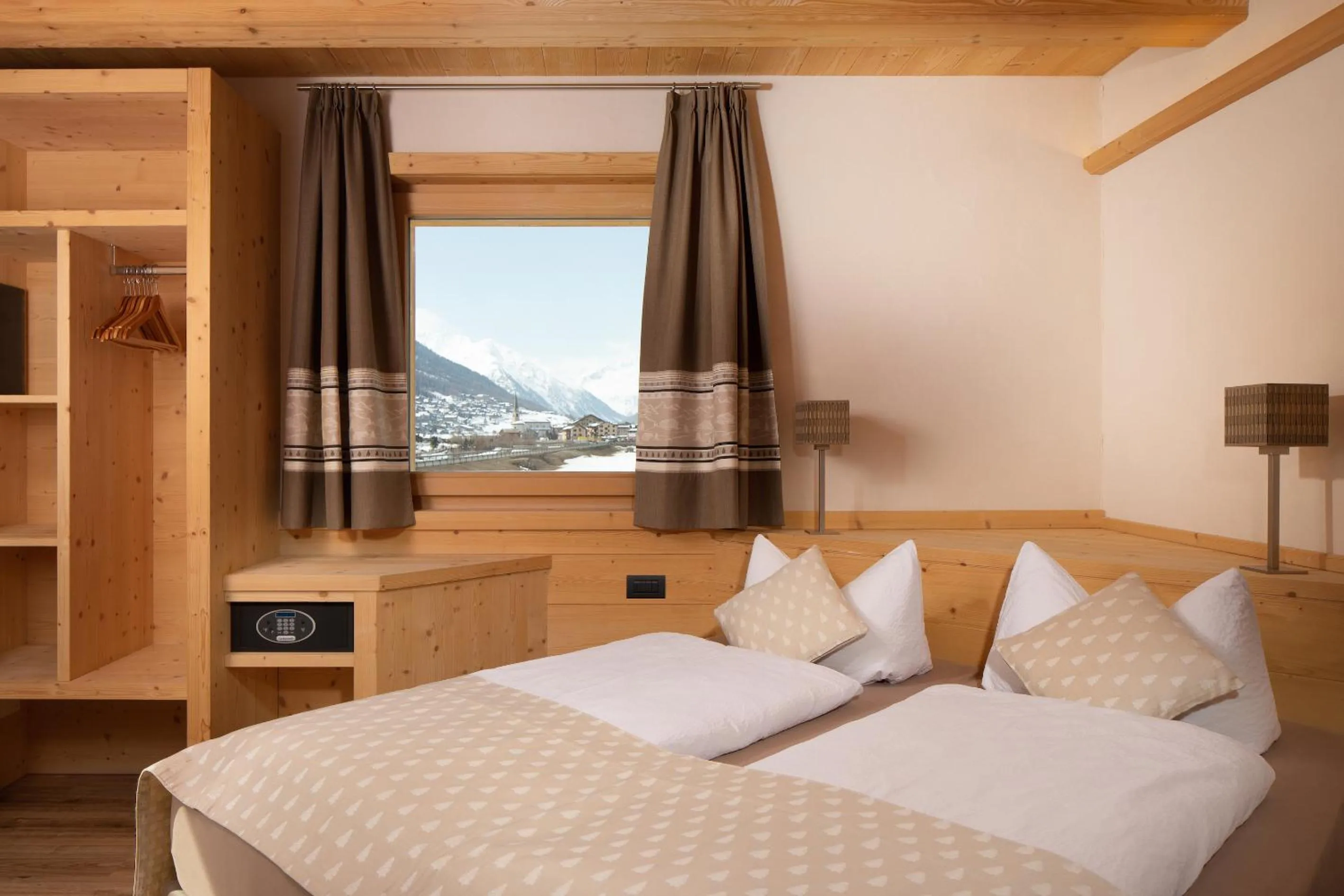 Bed in B&B Ecohotel Chalet des Alpes