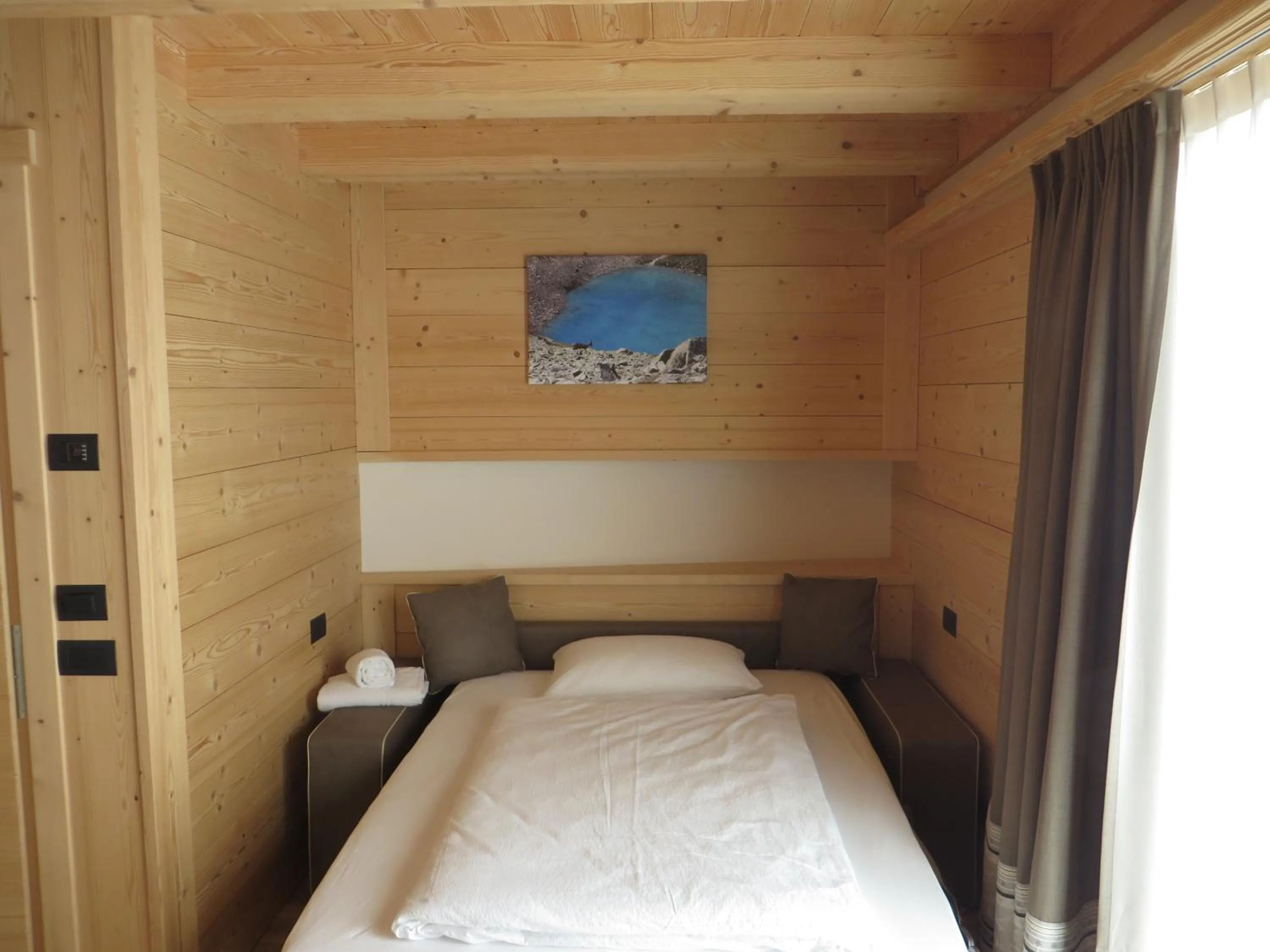 Bed in B&B Ecohotel Chalet des Alpes