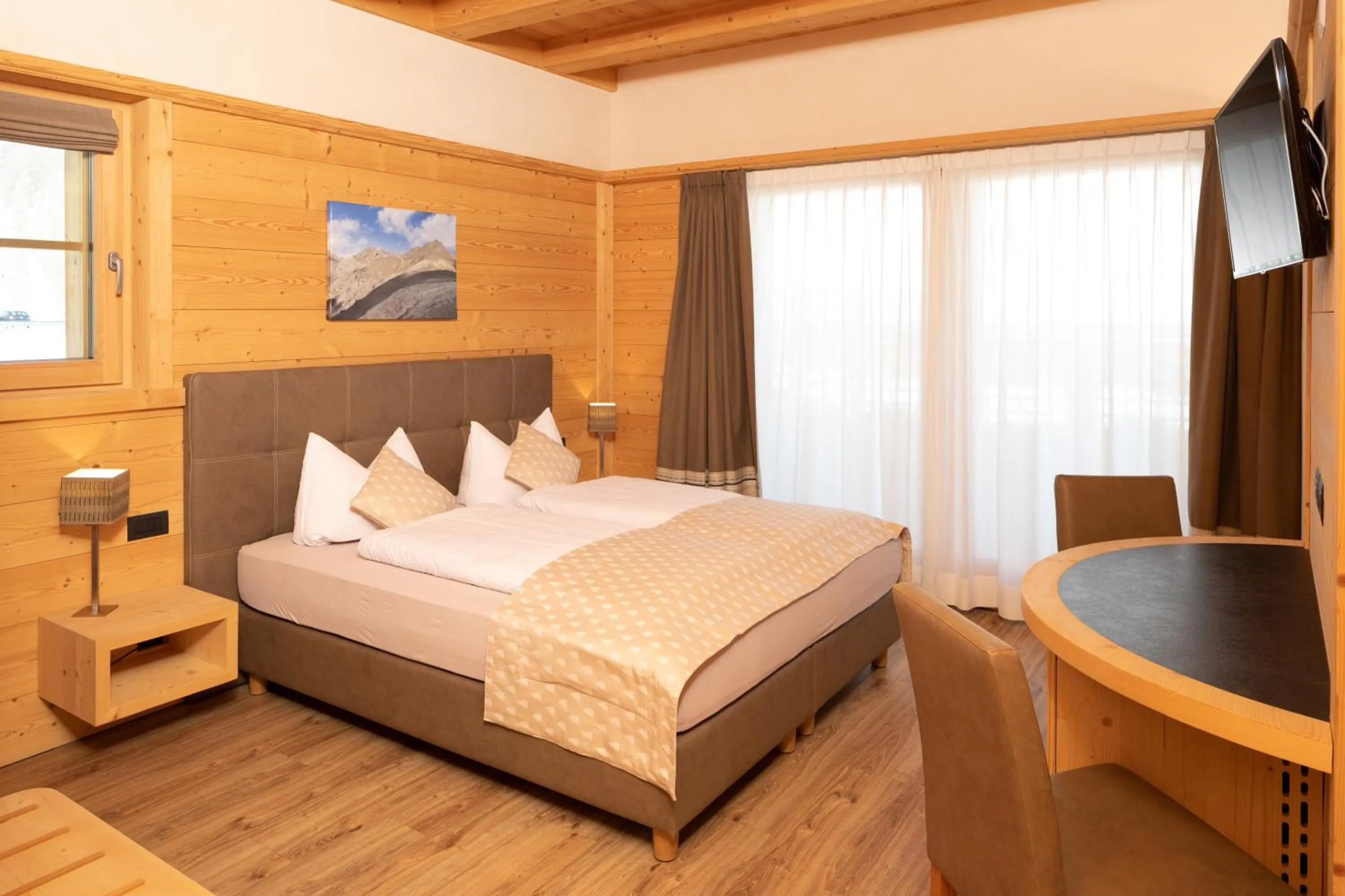 Bed in B&B Ecohotel Chalet des Alpes