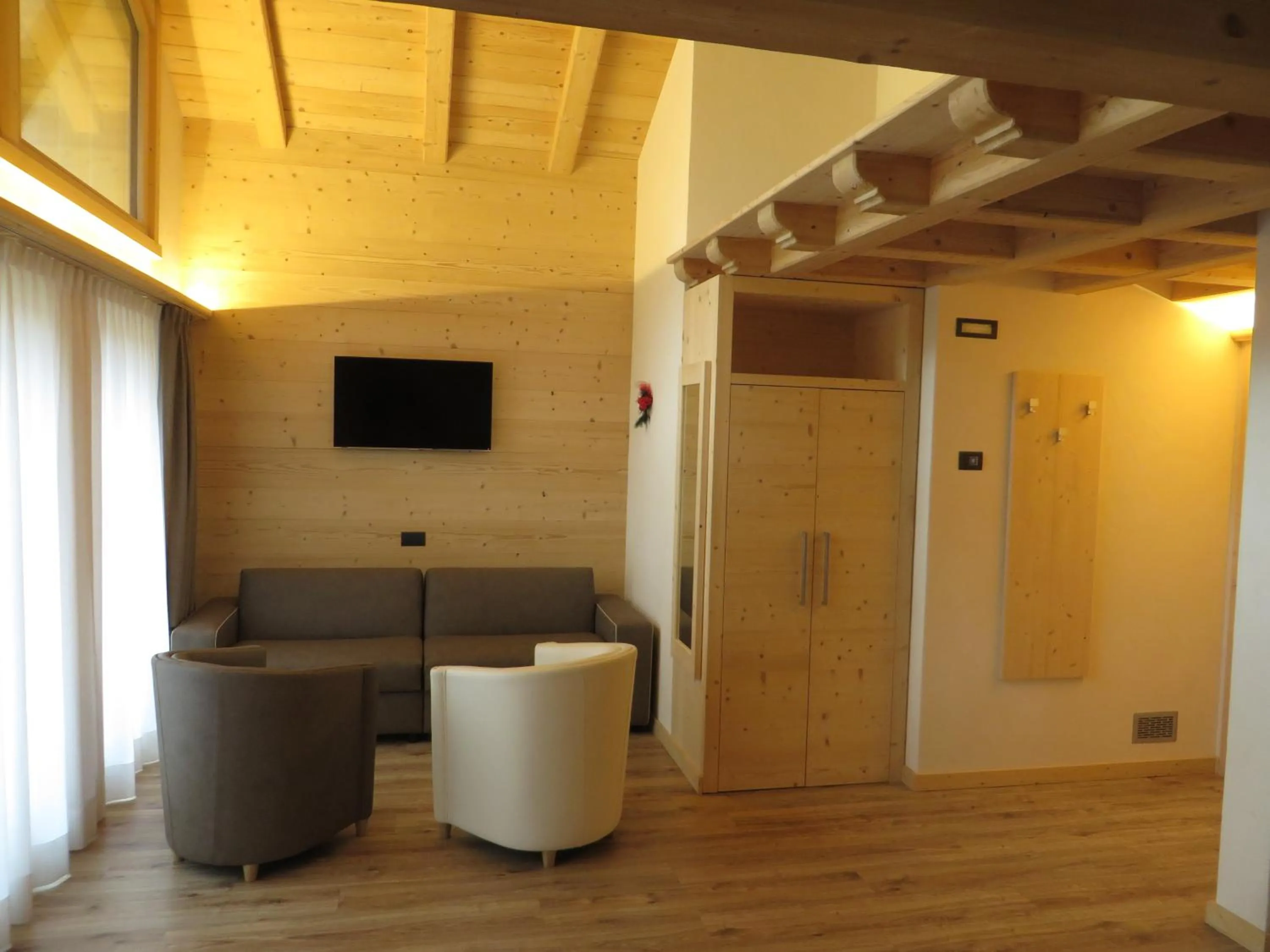 Photo of the whole room in B&B Ecohotel Chalet des Alpes