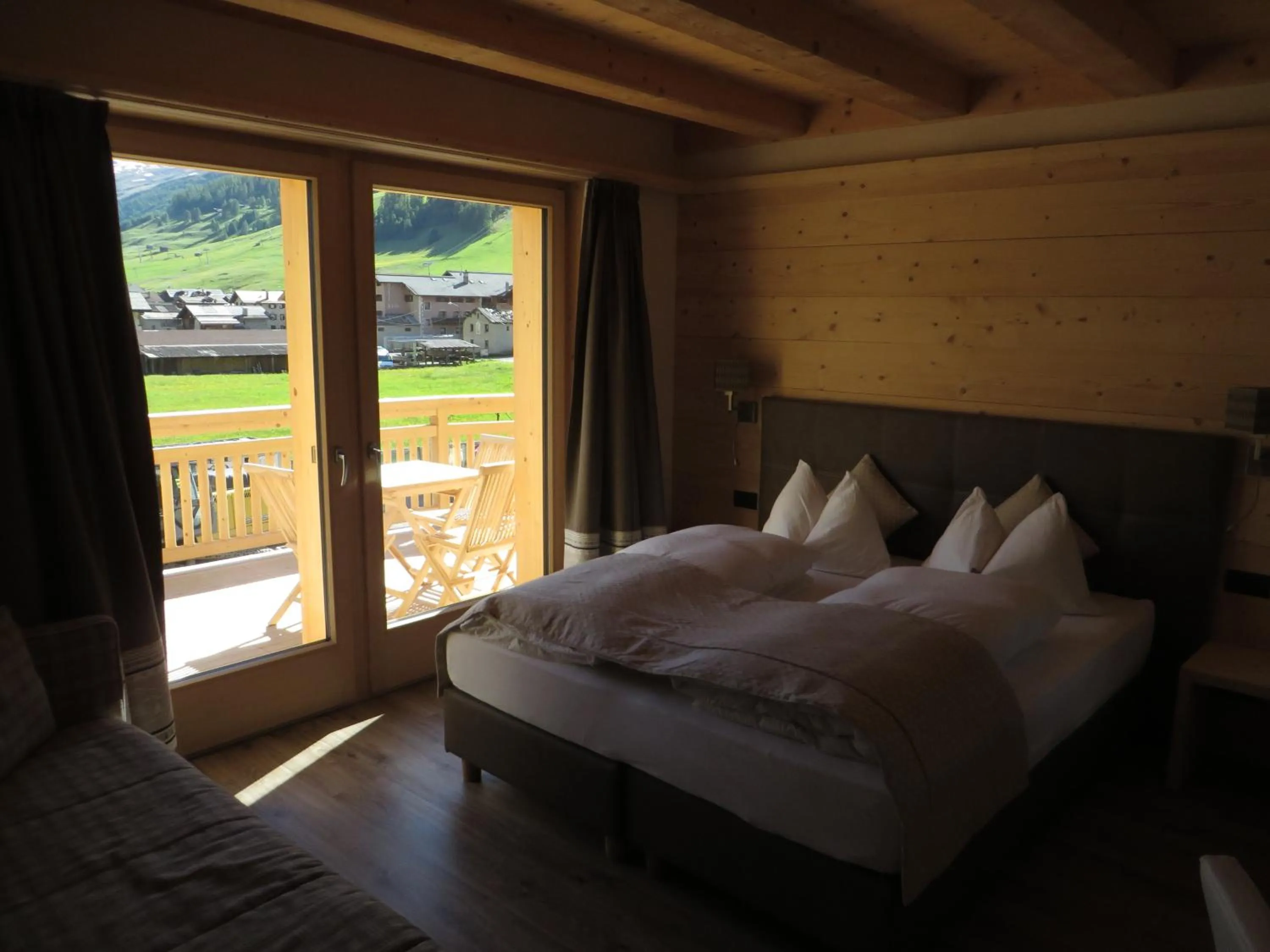 Bed in B&B Ecohotel Chalet des Alpes