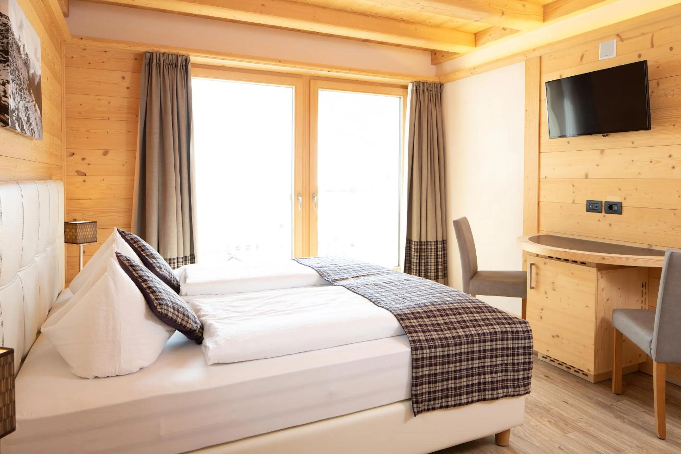 Bed in B&B Ecohotel Chalet des Alpes