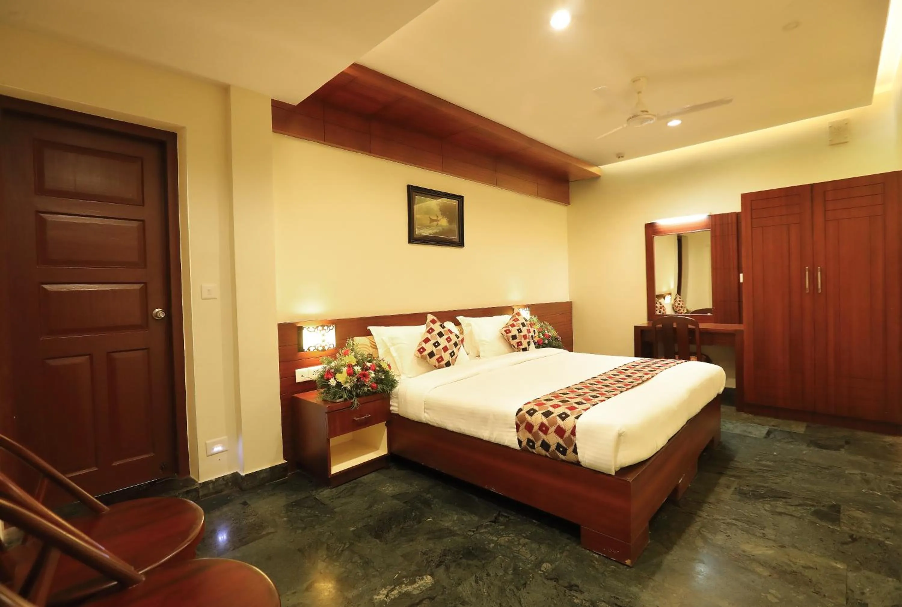 Bed in Hotel Indraprastha varkala