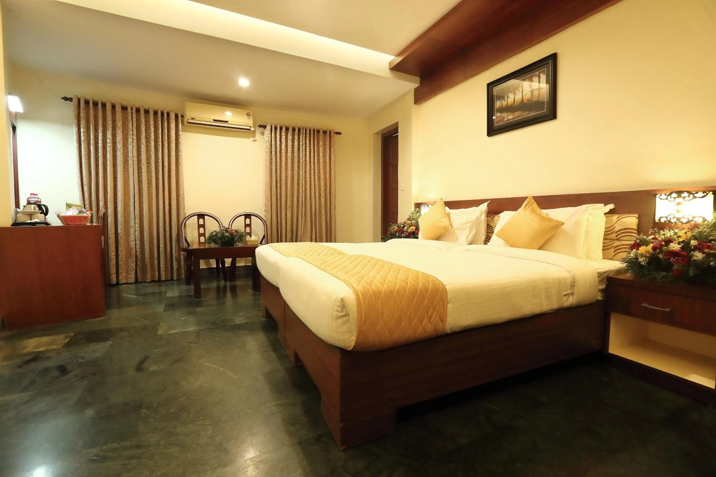 Bed in Hotel Indraprastha varkala