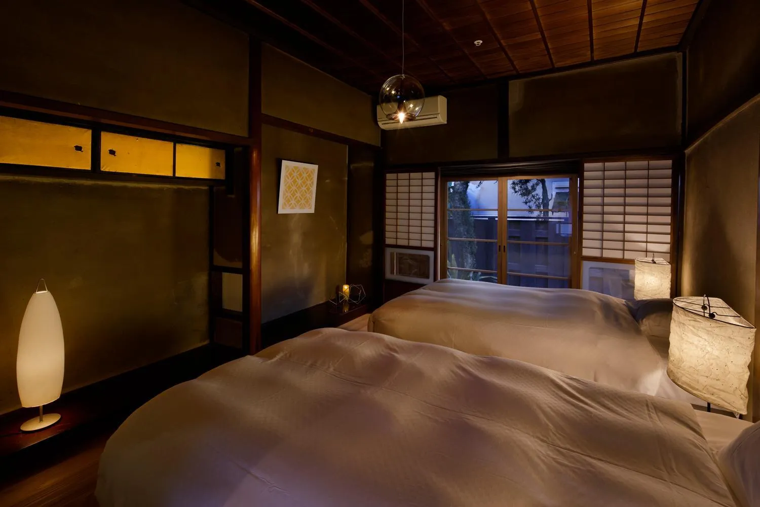 Bed in NIPPONIA Sasayama Castle Town Hotel