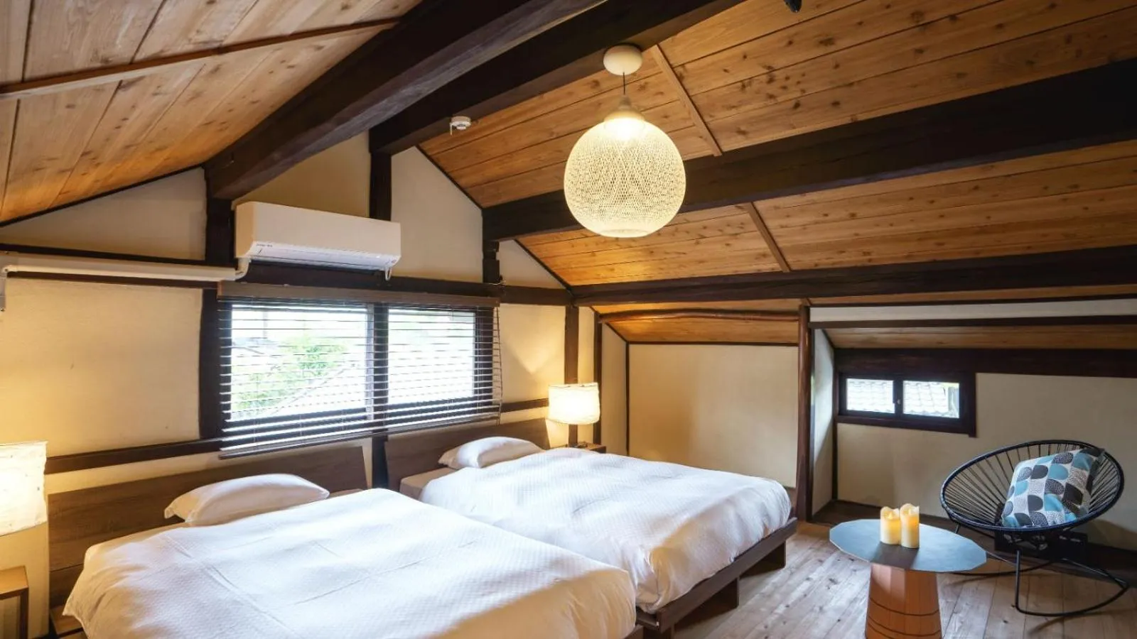 Bed in NIPPONIA Sasayama Castle Town Hotel