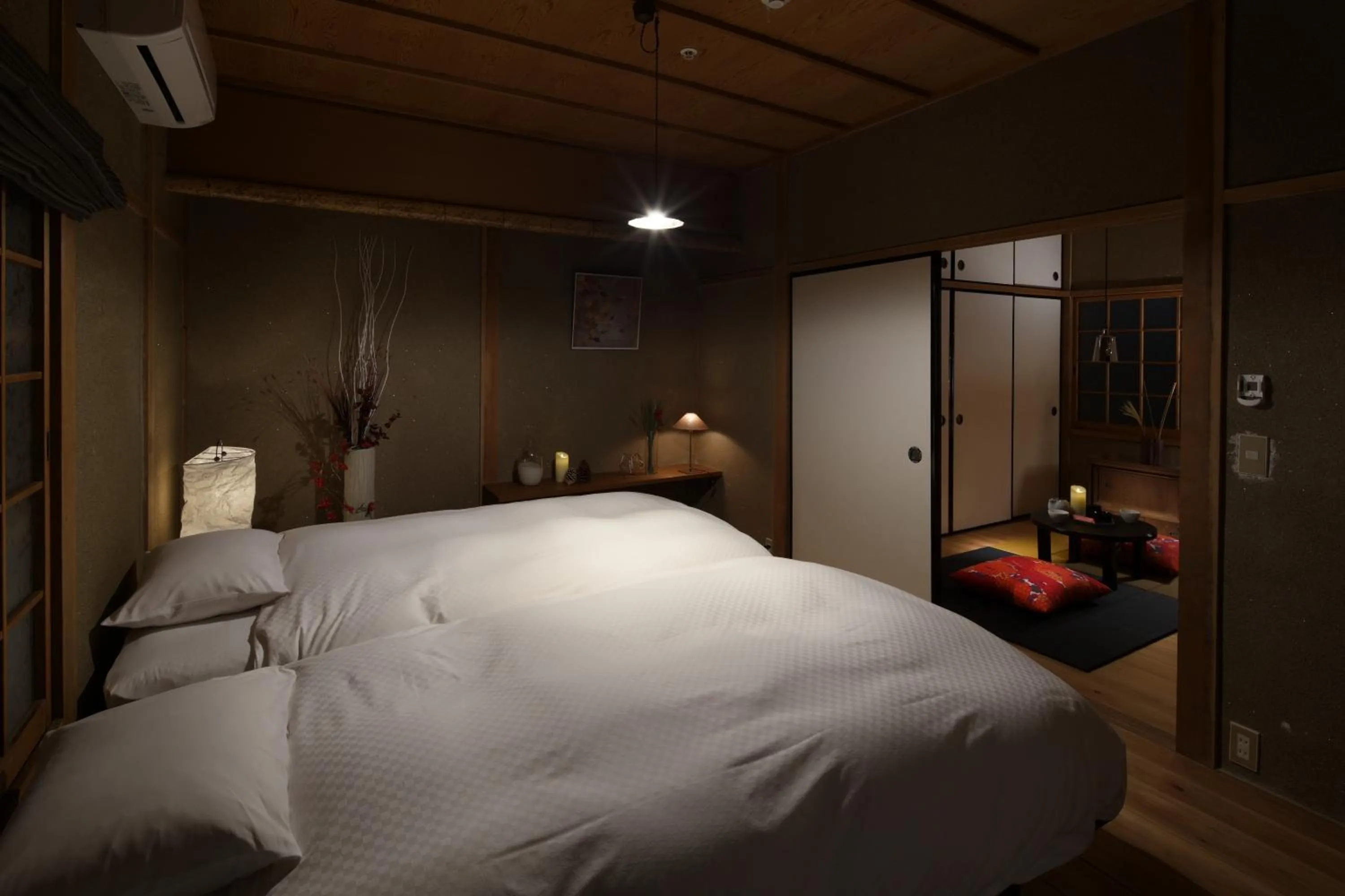 Bed in NIPPONIA Sasayama Castle Town Hotel