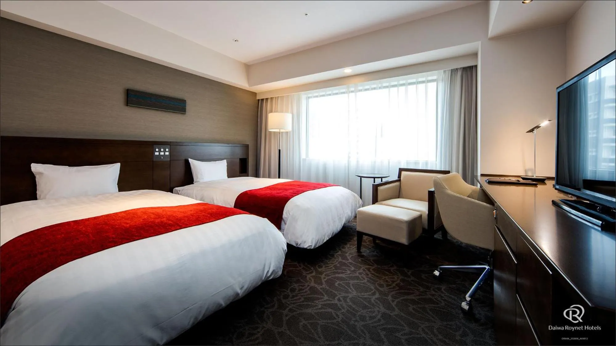 Photo of the whole room, Bed in Daiwa Roynet Hotel Matsuyama