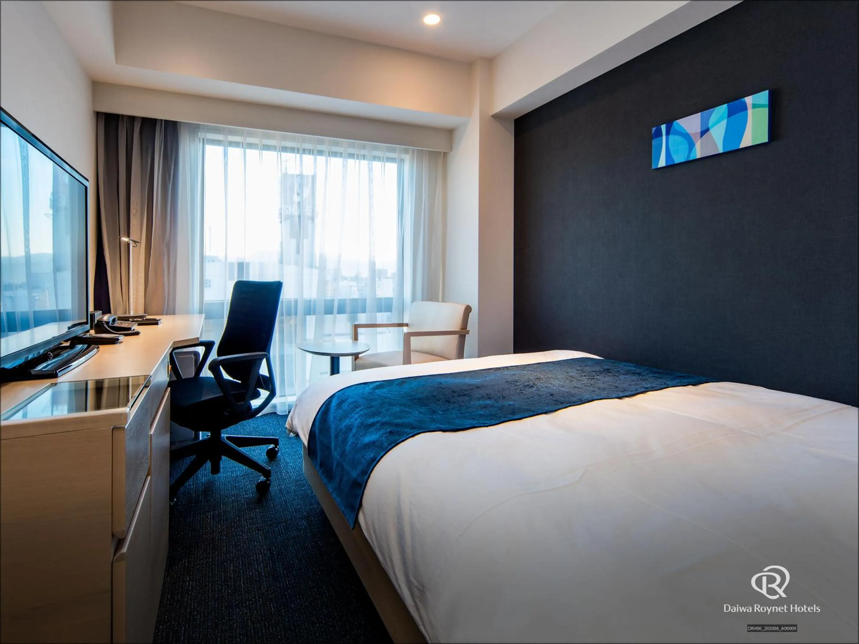 Photo of the whole room, Bed in Daiwa Roynet Hotel Matsuyama