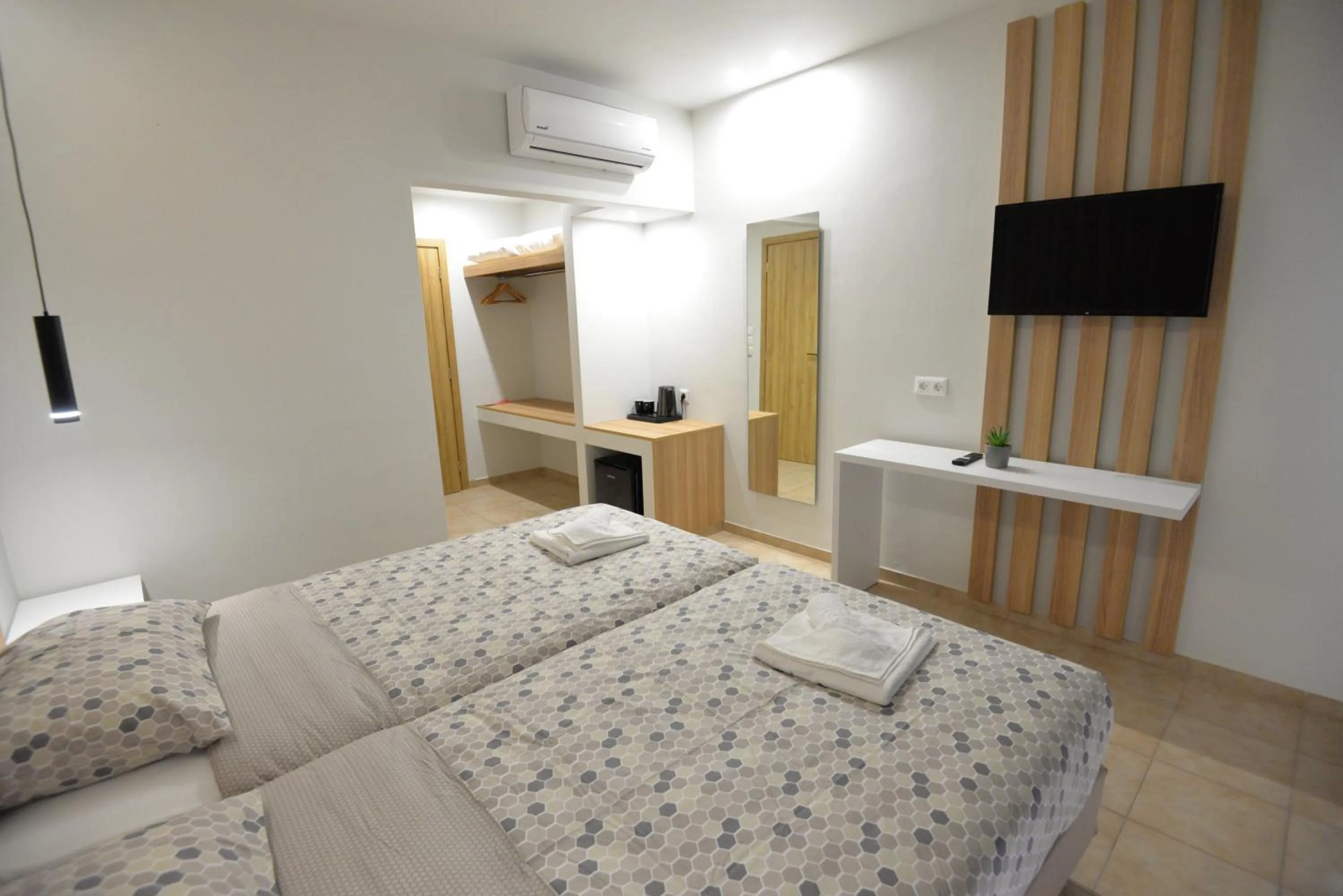 Bed in Heleni Beach Hotel