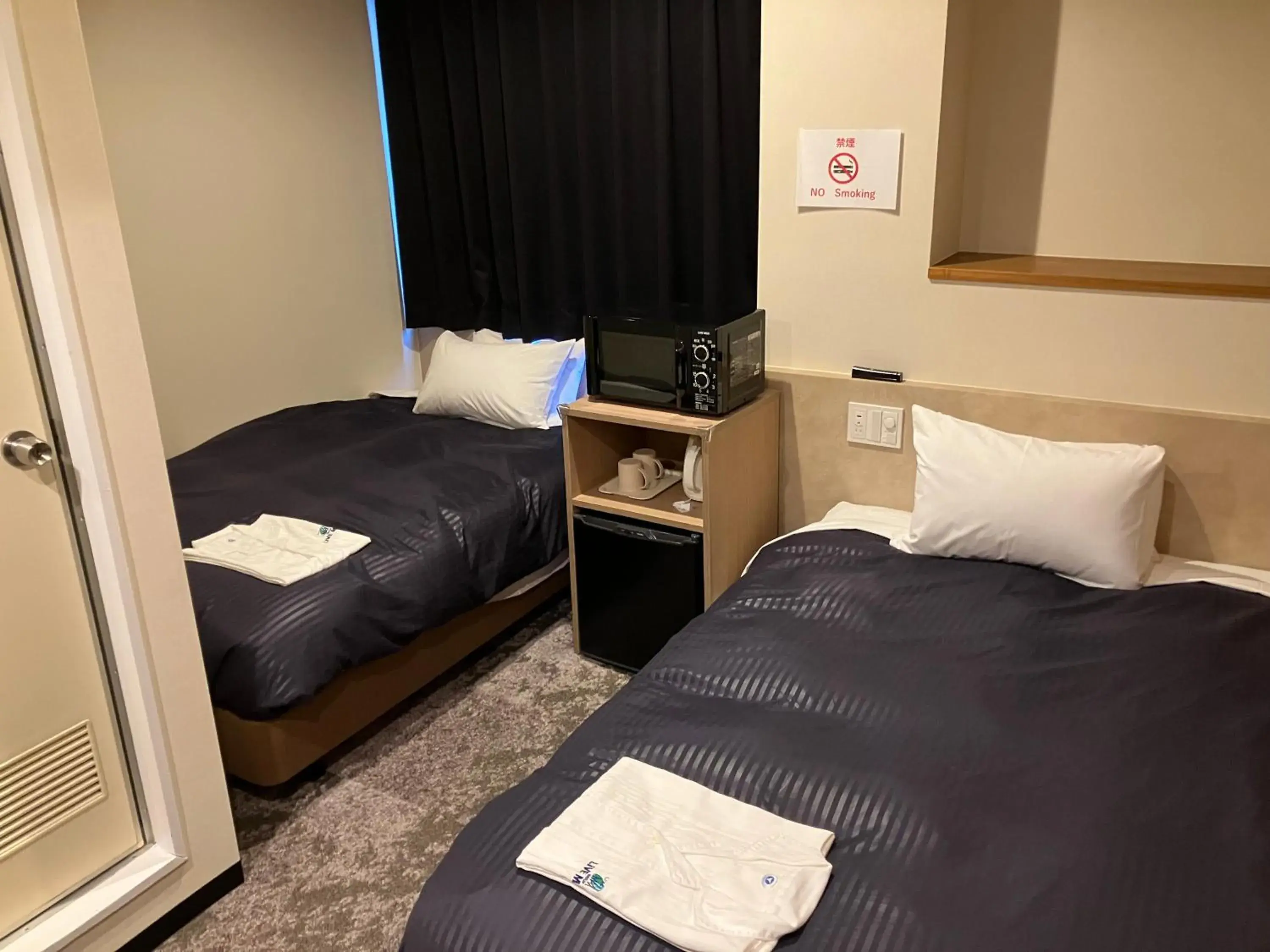 Twin Room - single occupancy - Non-Smoking in HOTEL LiVEMAX Mihara Ekimae Twin Room - single occupancy - Non-Smoking in HOTEL LiVEMAX Mihara Ekimae