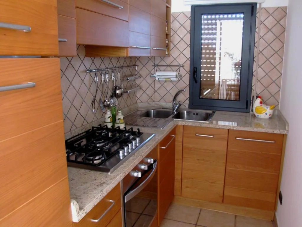 Kitchen or kitchenette in B&B La Piccola Oasi