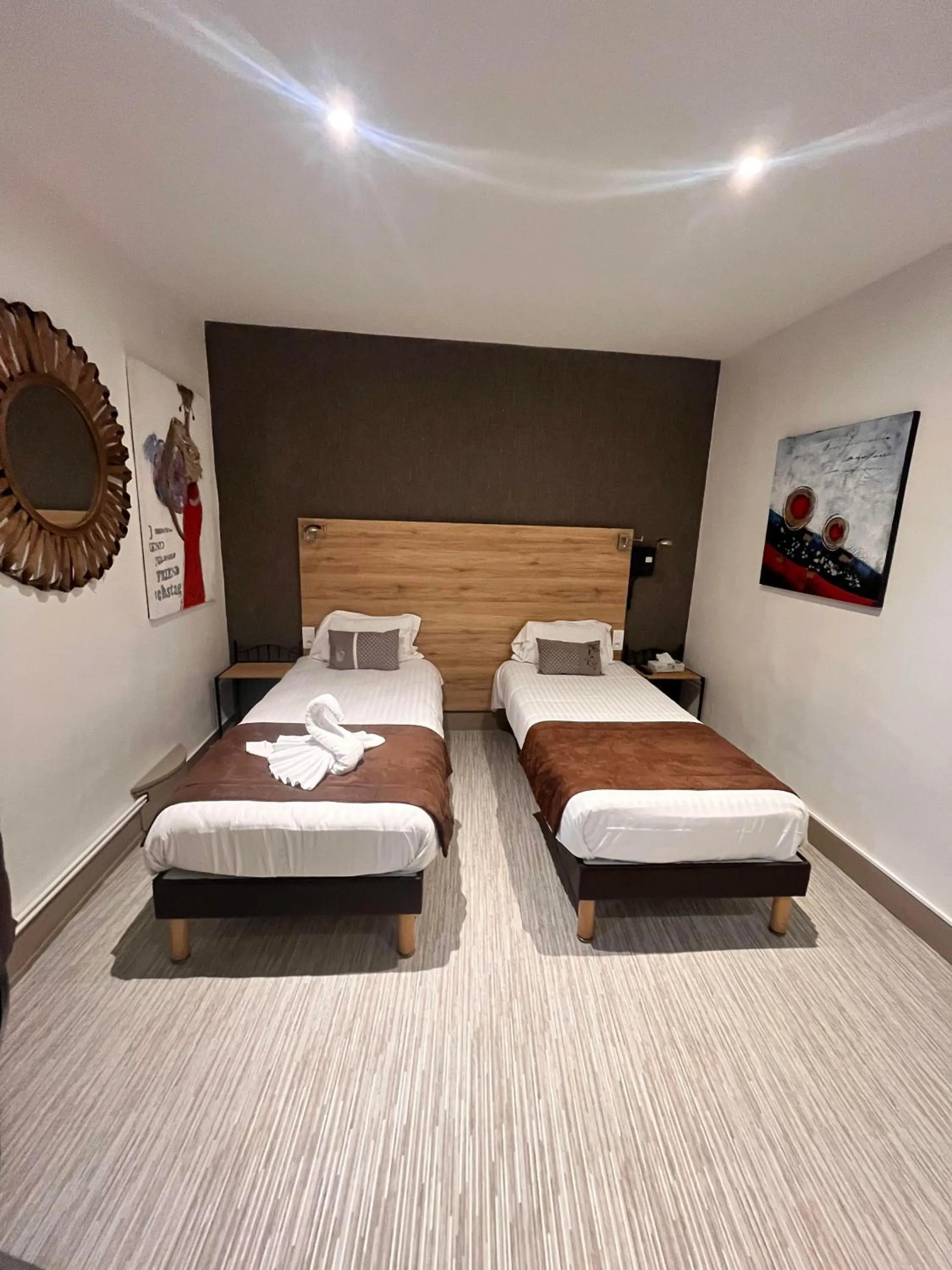 Bed in Hôtel L'Univers