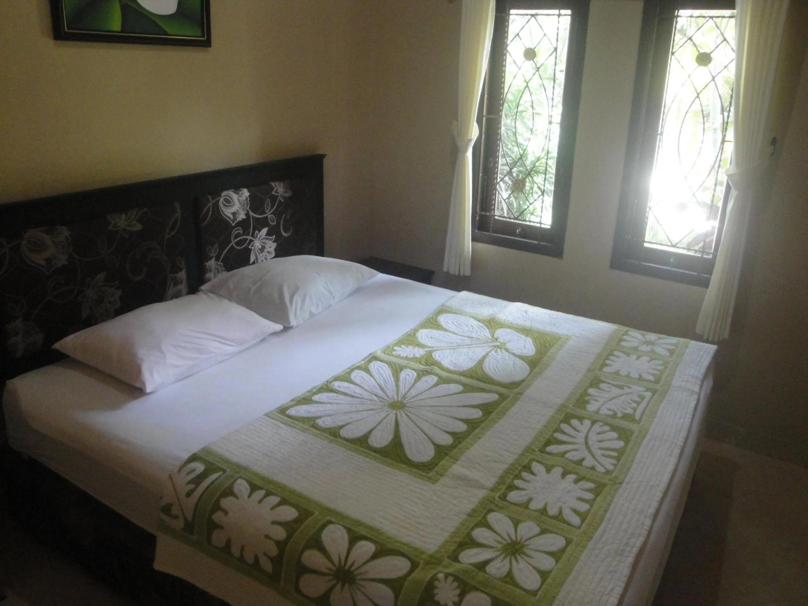 Bedroom, Bed in Sari Inn Kuta Lombok