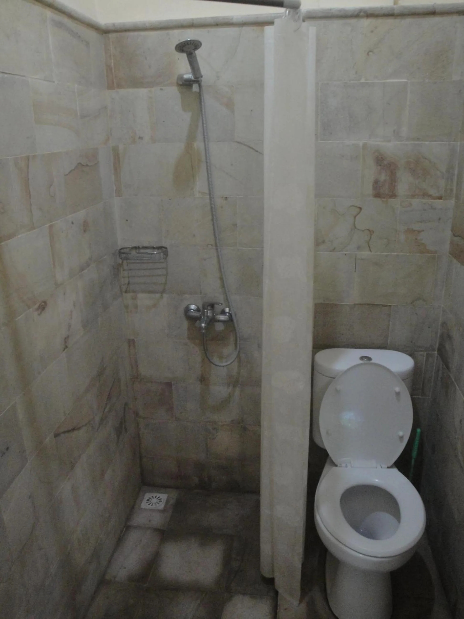 Bathroom in Sari Inn Kuta Lombok