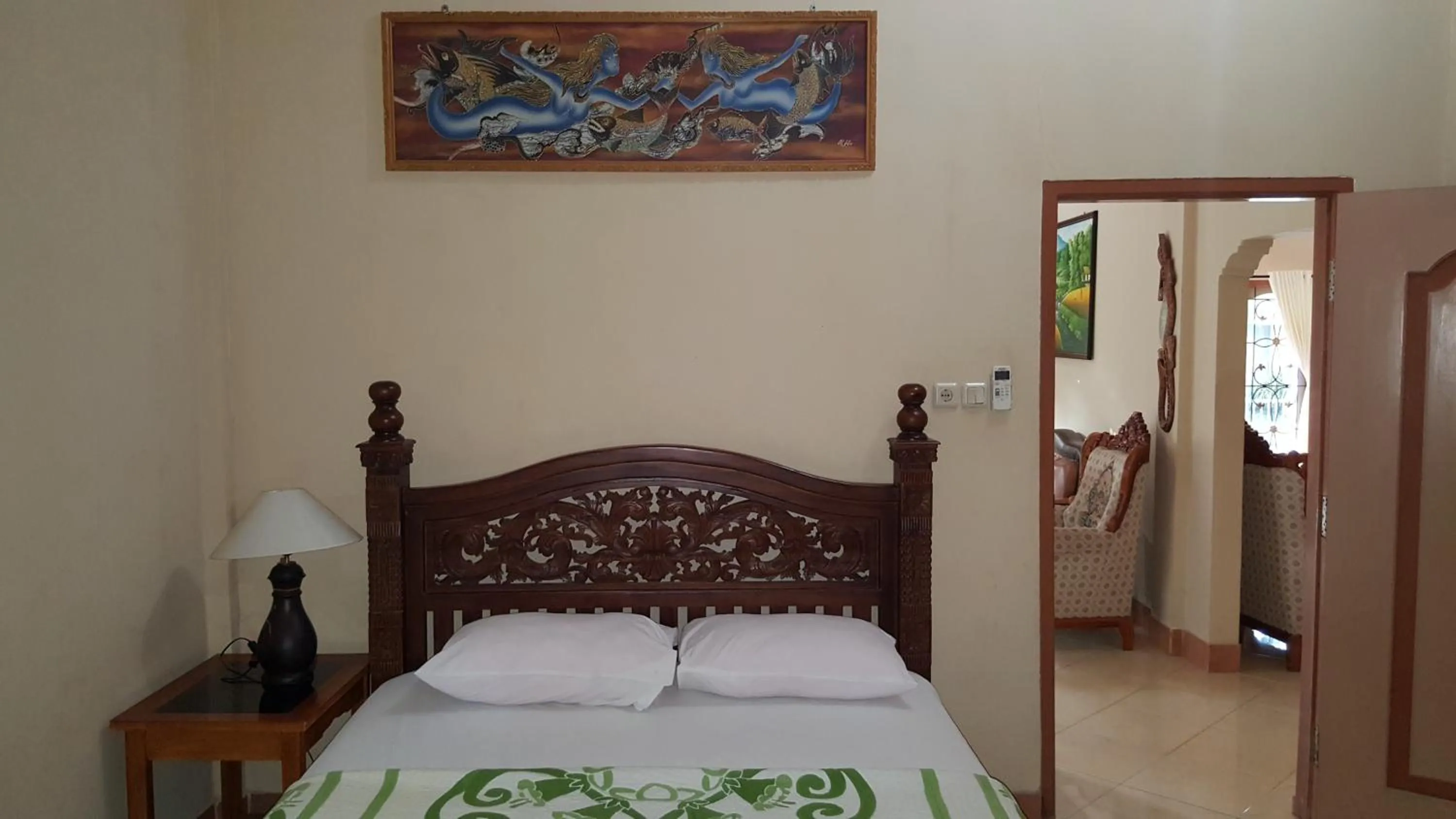 Bedroom, Bed in Sari Inn Kuta Lombok