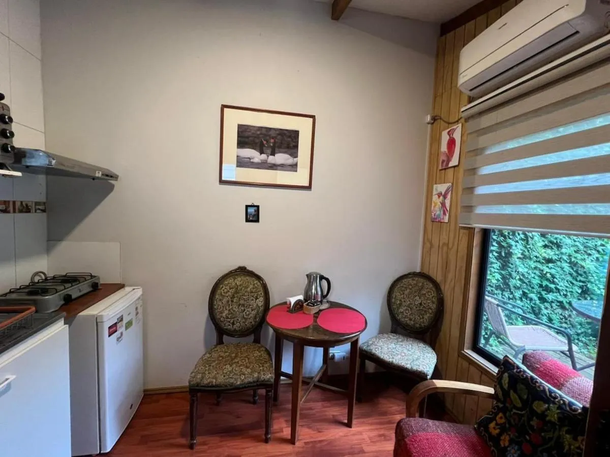 Living room in Hospedaje El Roble, Puerto Varas