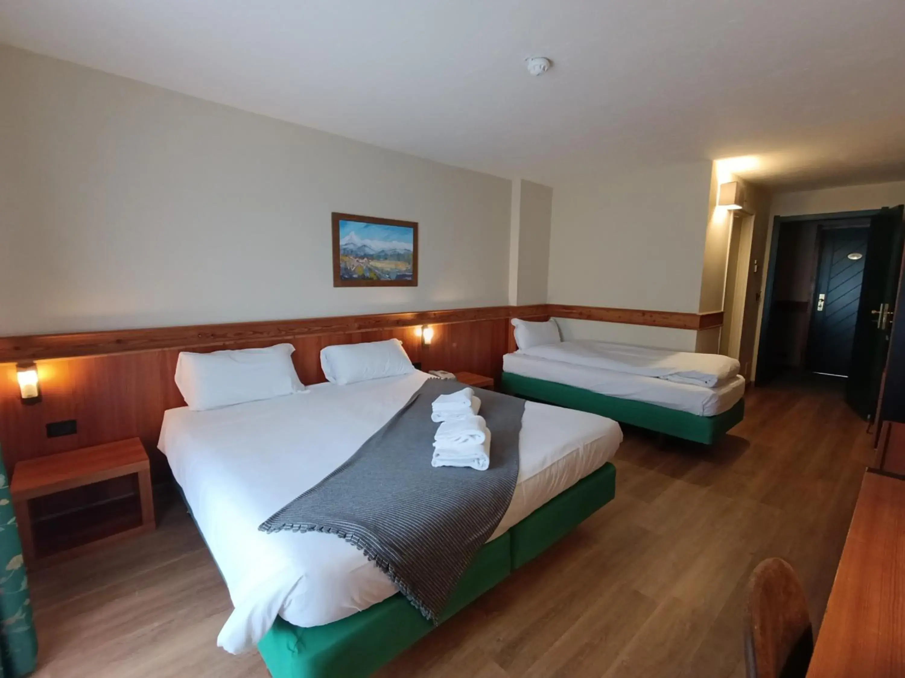 Triple Room with Balcony in Hotel De Champoluc Triple Room with Balcony in Hotel De Champoluc