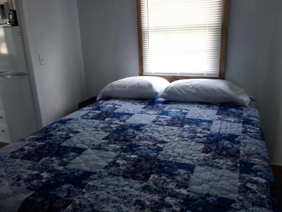 Bed in Old Wooden Bridge Resort & Marina