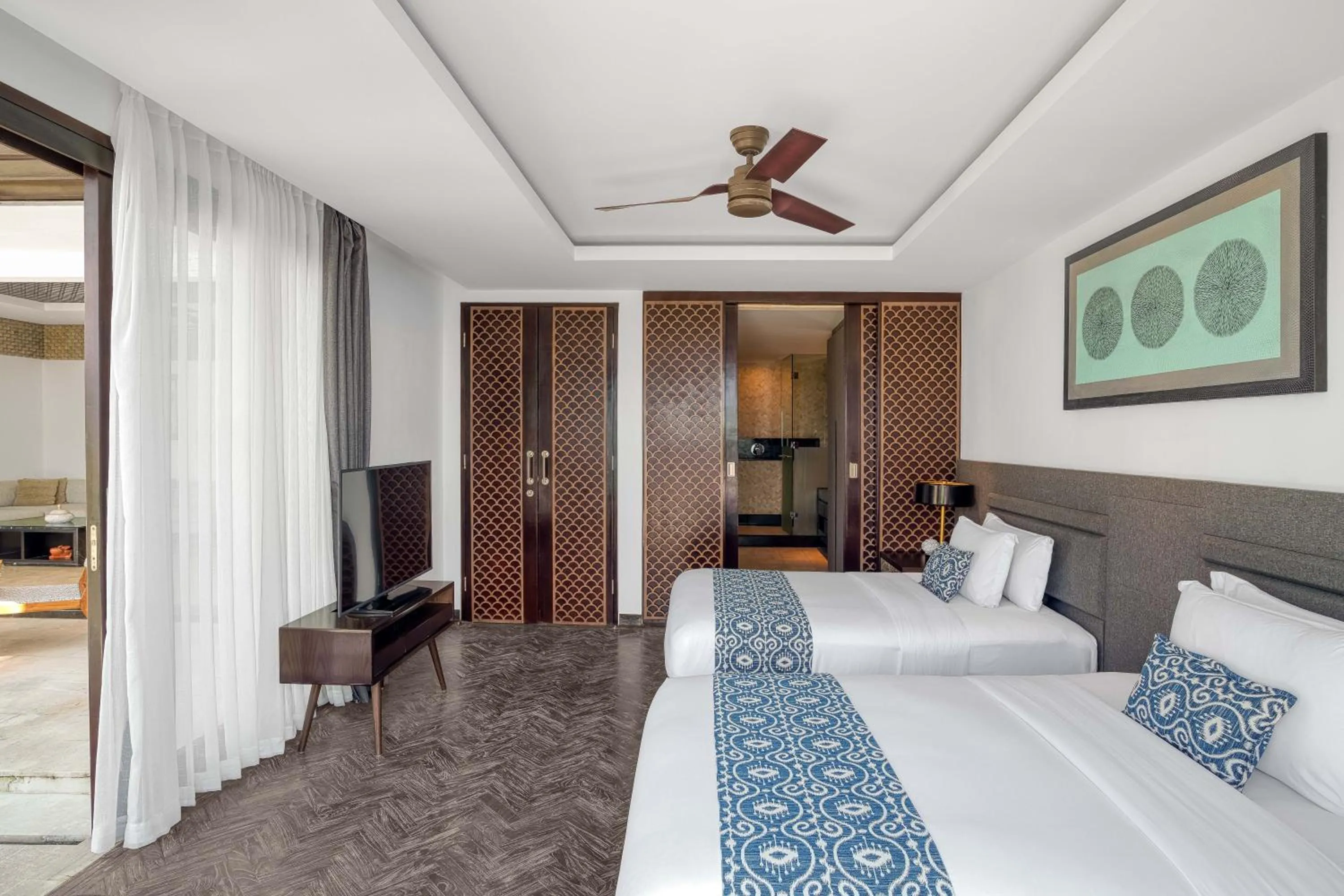 Bed in Prasana Villas by Arjani Resorts