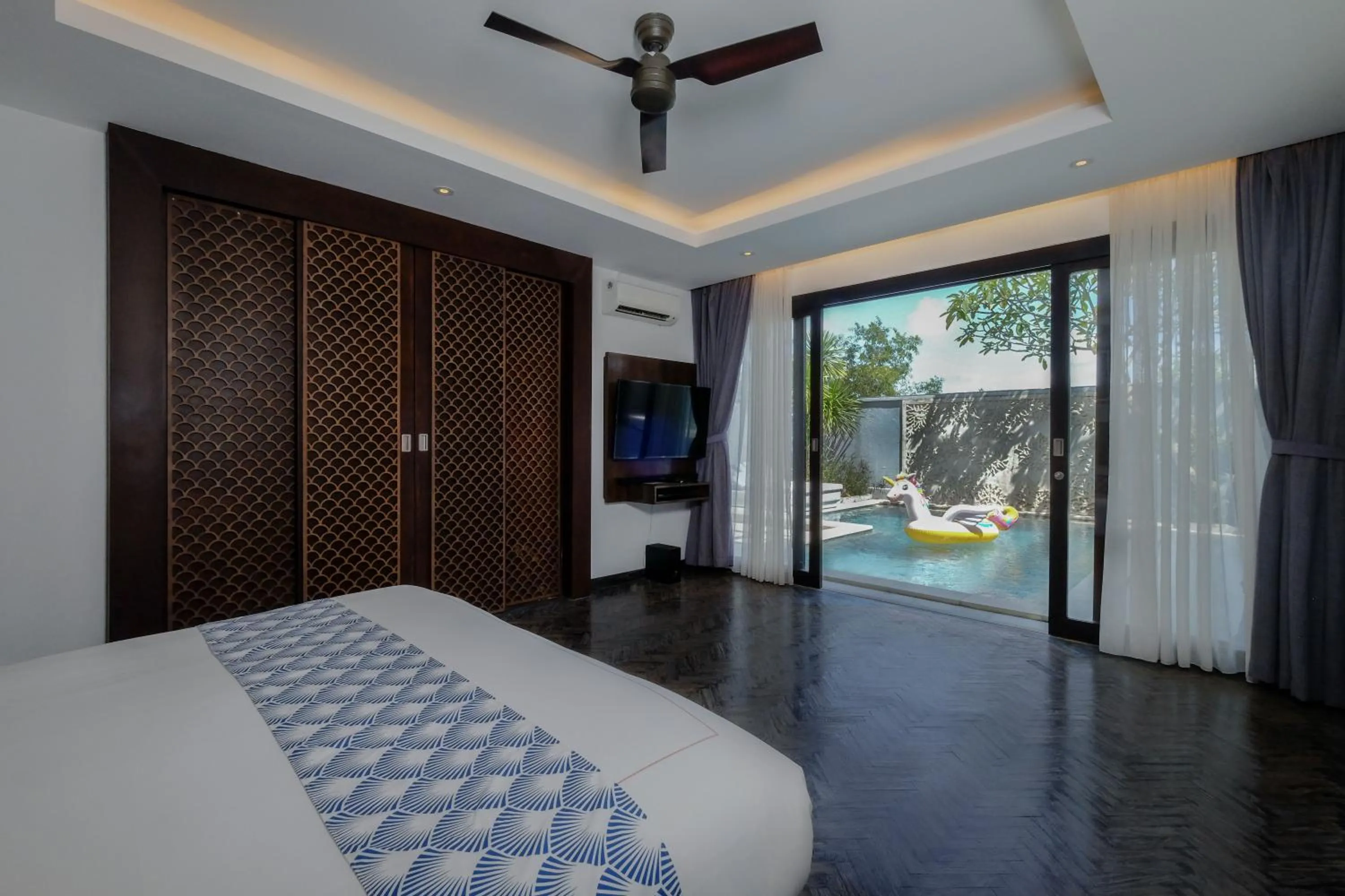 Bed in Prasana Villas by Arjani Resorts