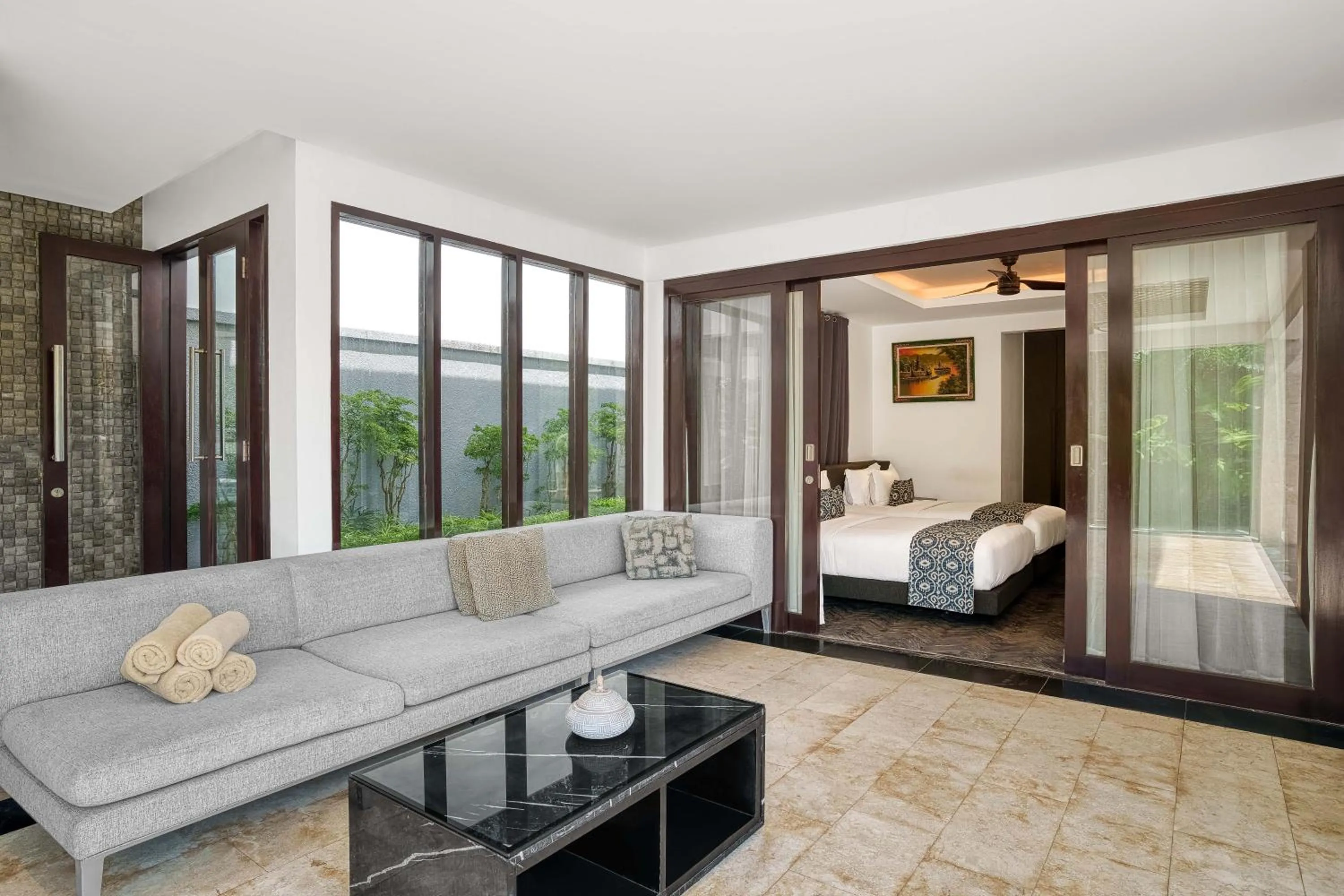 Bed in Prasana Villas by Arjani Resorts