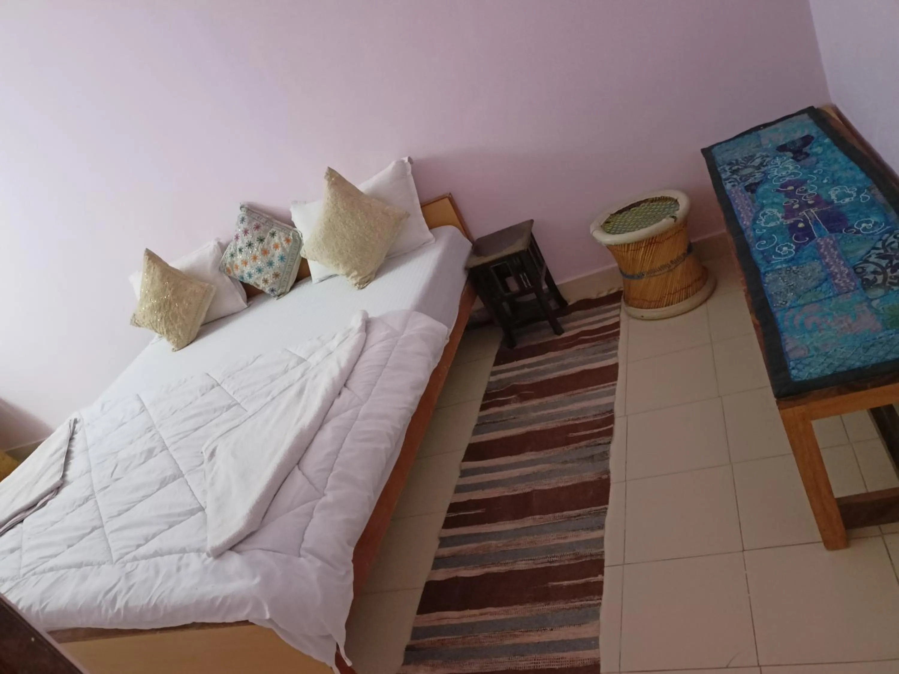 Bed in Shiva Guest House
