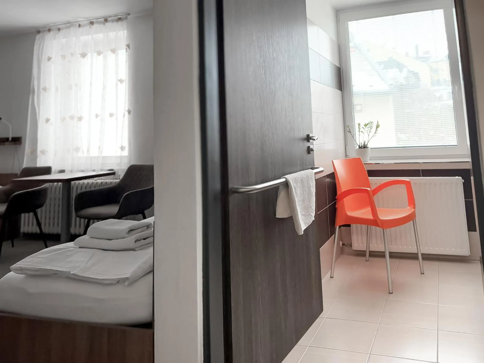 Bathroom, Bed in Hotel Pod Radnicí