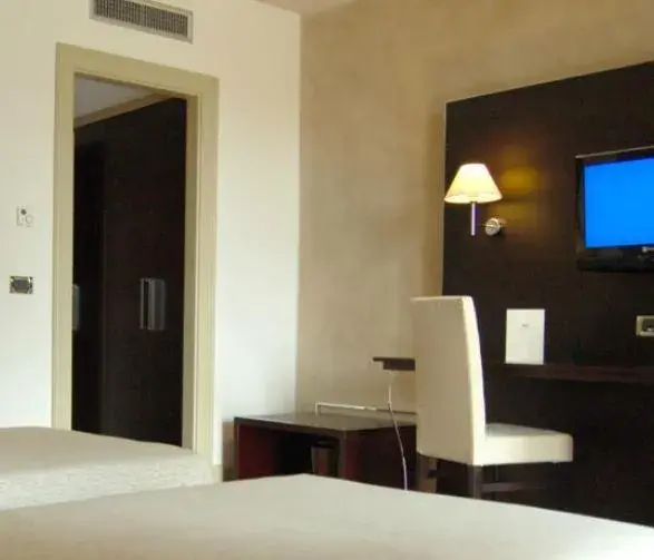 Triple Room in Cremona Palace Hotel Triple Room in Cremona Palace Hotel