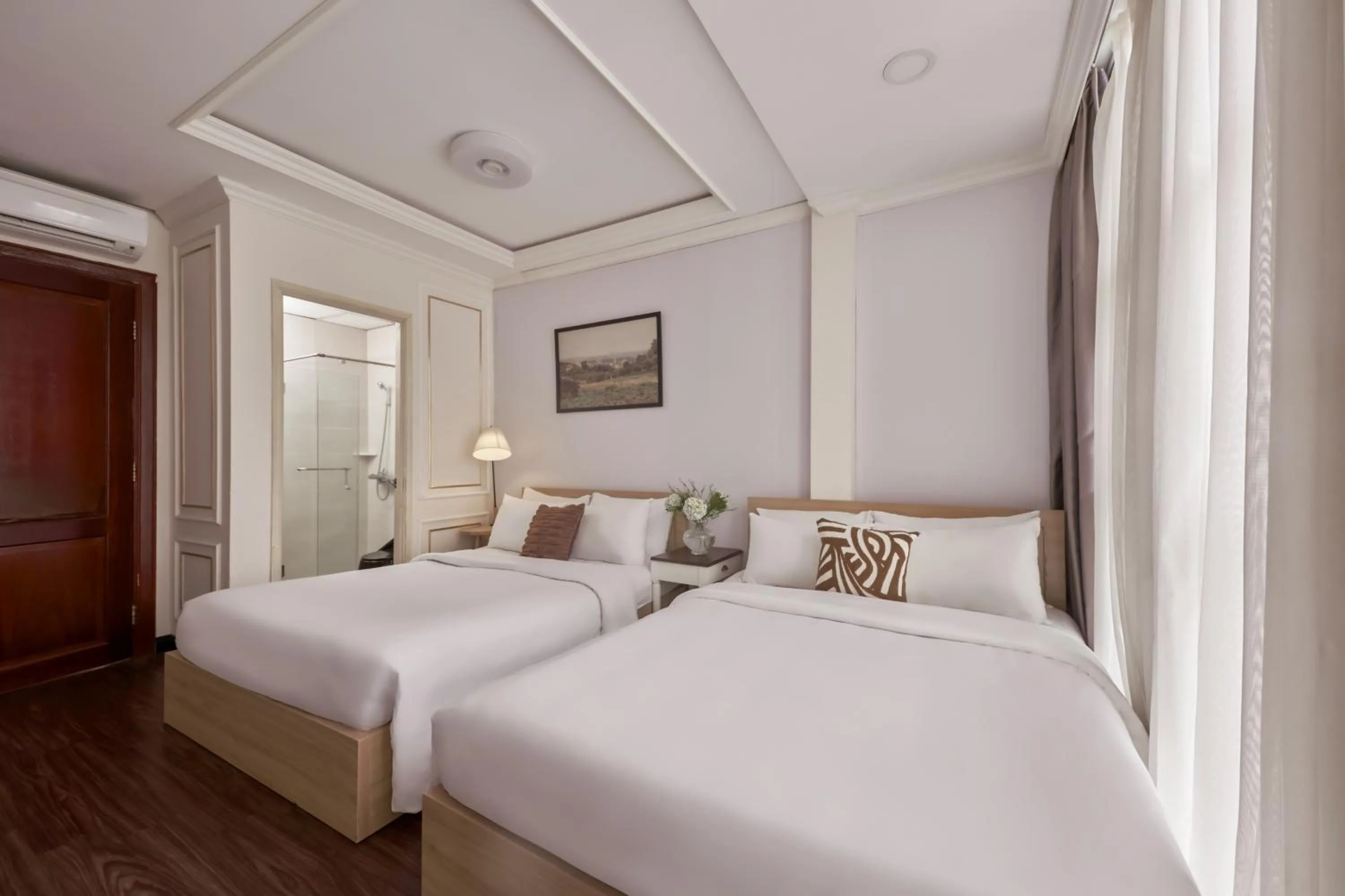 Bed in Quy Hung Hotel And Spa Central