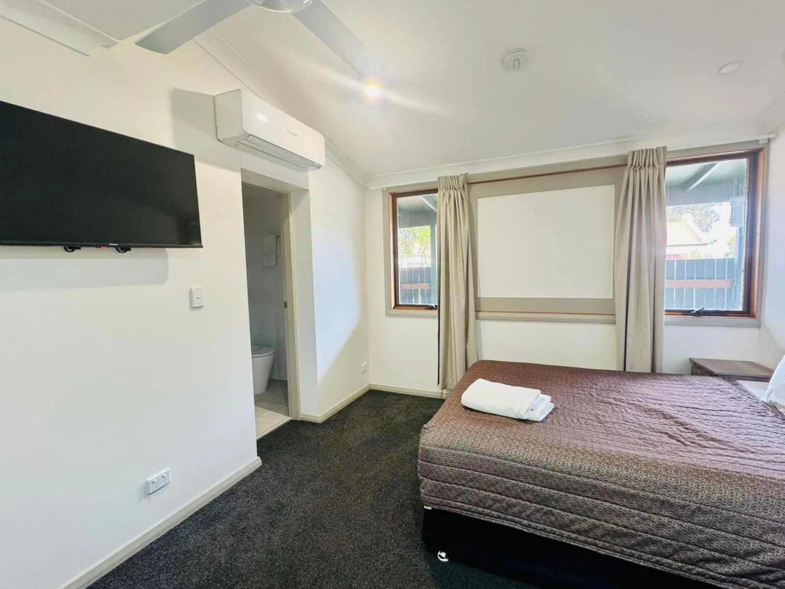 Bed in Ten Dollar Town Motel