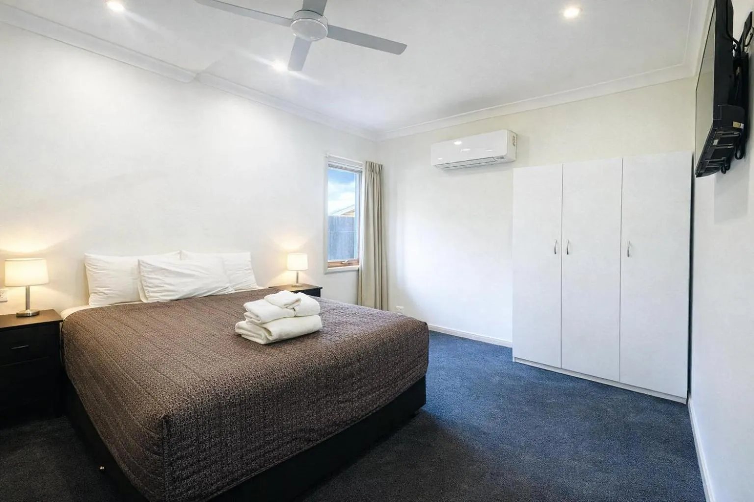 Bed in Ten Dollar Town Motel