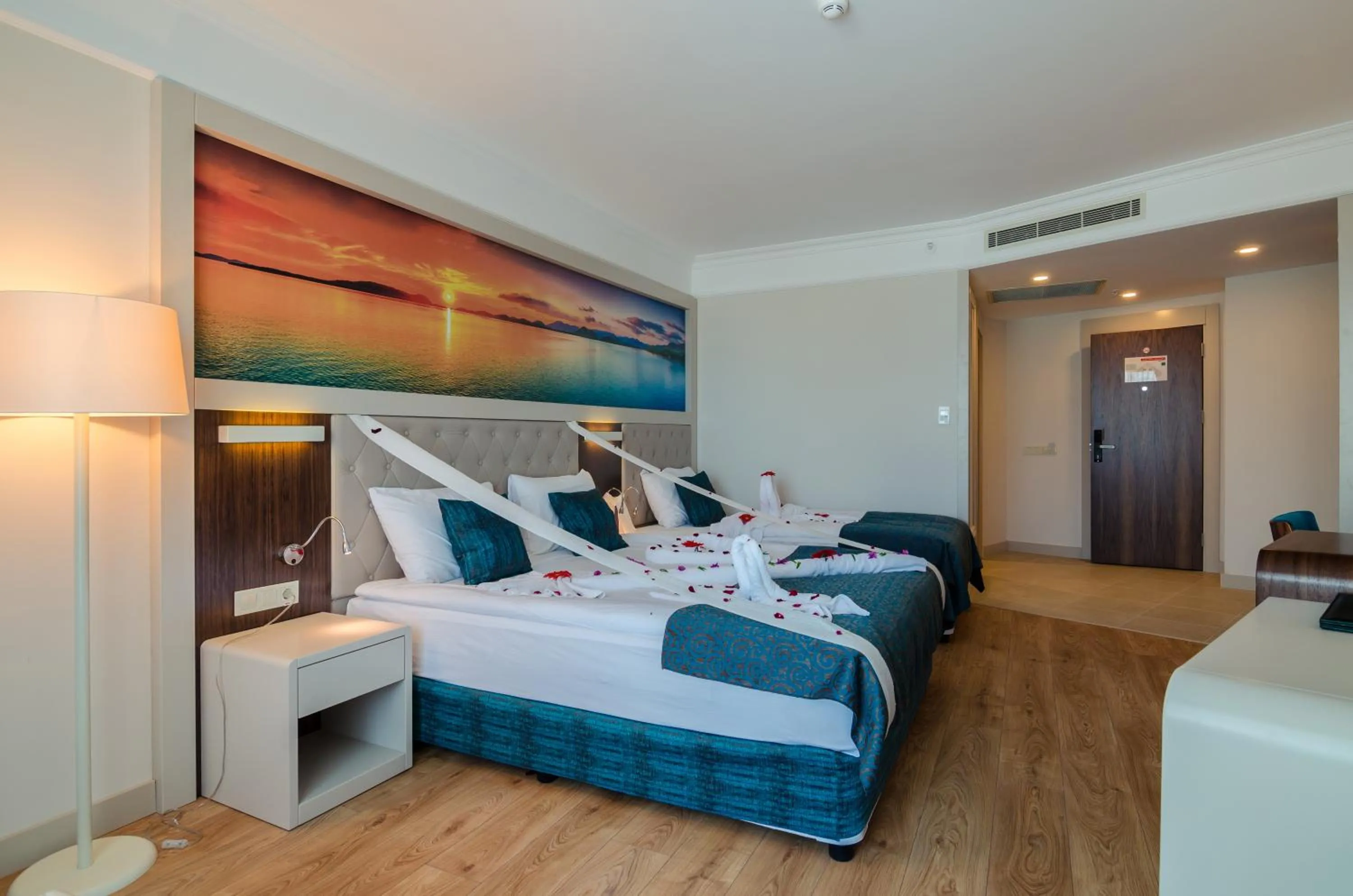 Photo of the whole room, Bed in The Lumos Deluxe Resort Hotel & Spa