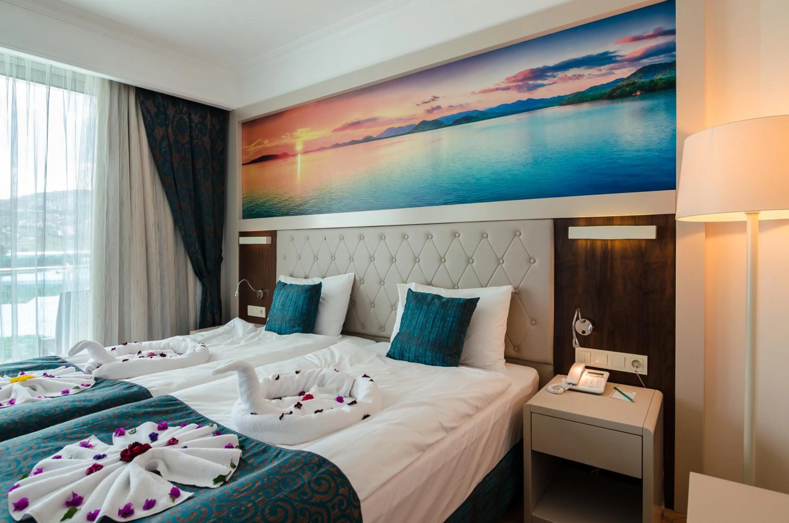 Bed in The Lumos Deluxe Resort Hotel & Spa