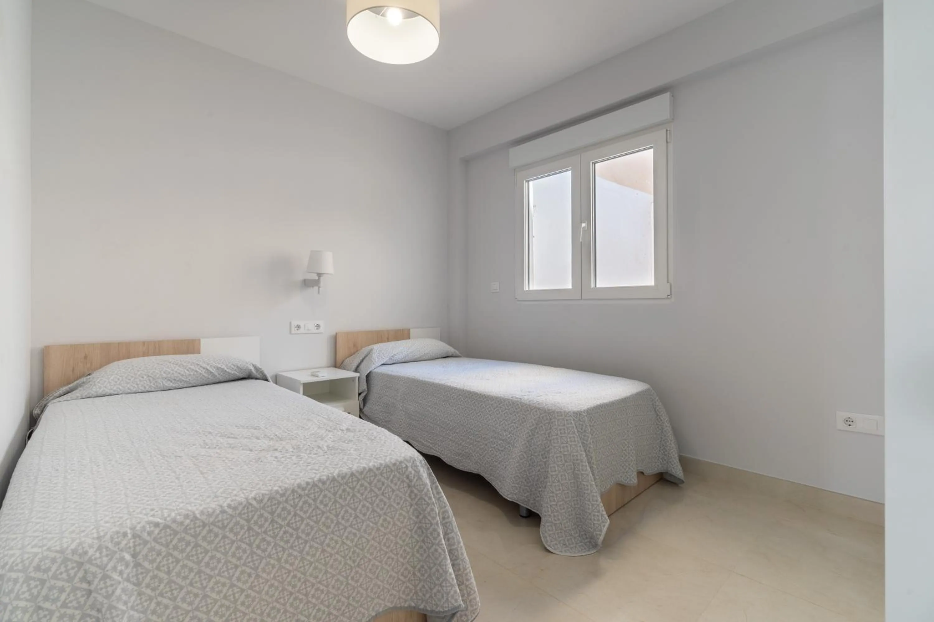 Bedroom, Bed in Apartamentos Castillo by Sur Suites