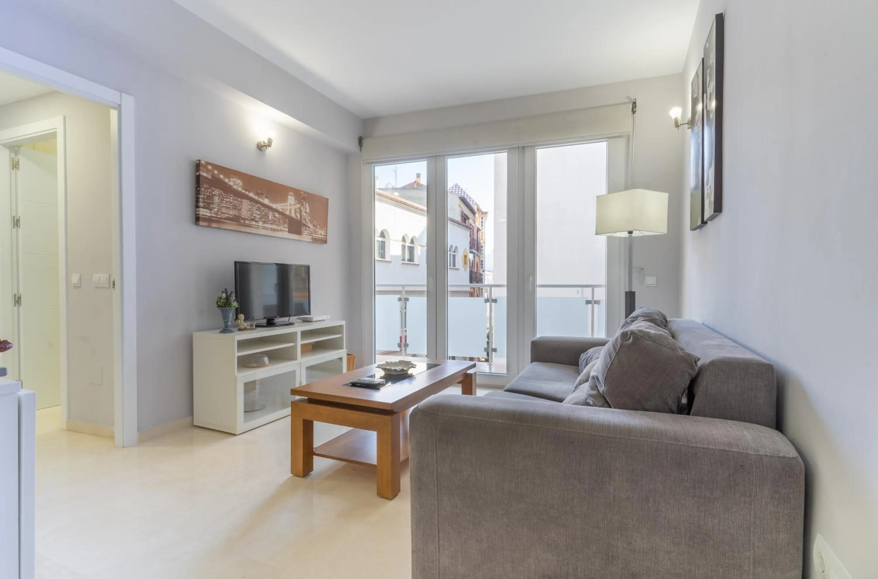 Living room in Apartamentos Castillo by Sur Suites