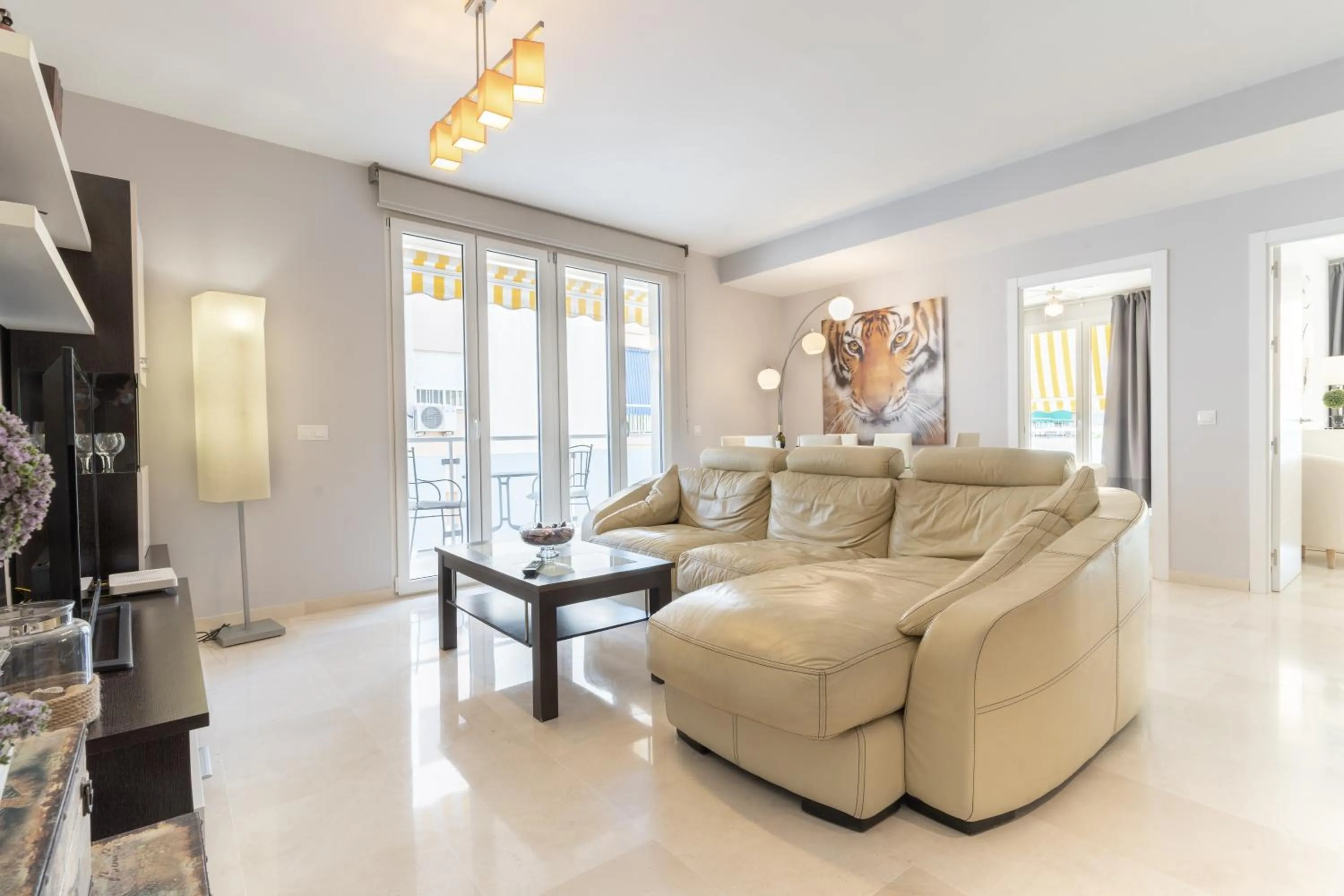 Living room in Apartamentos Castillo by Sur Suites