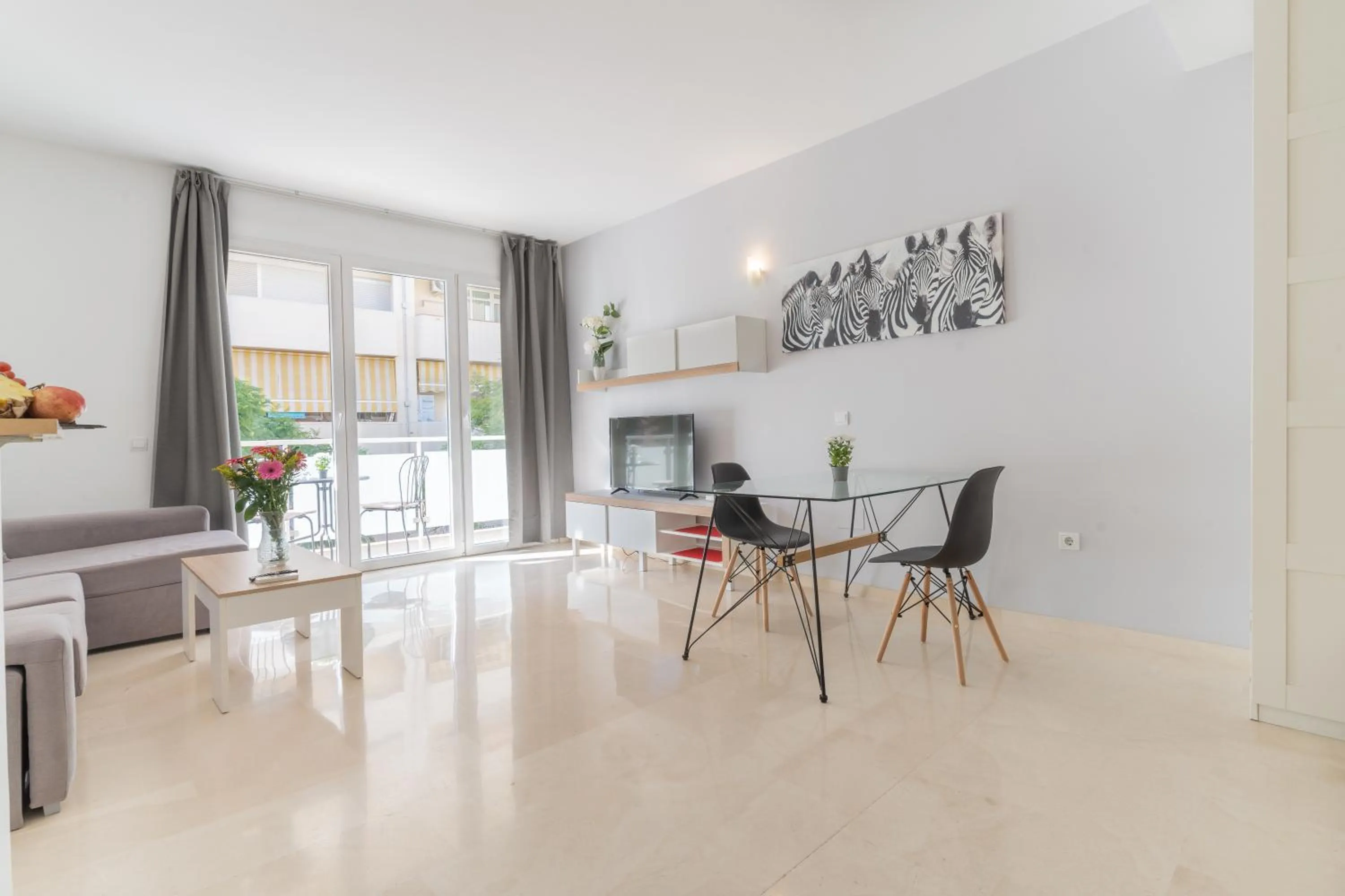 Seating area in Apartamentos Castillo by Sur Suites