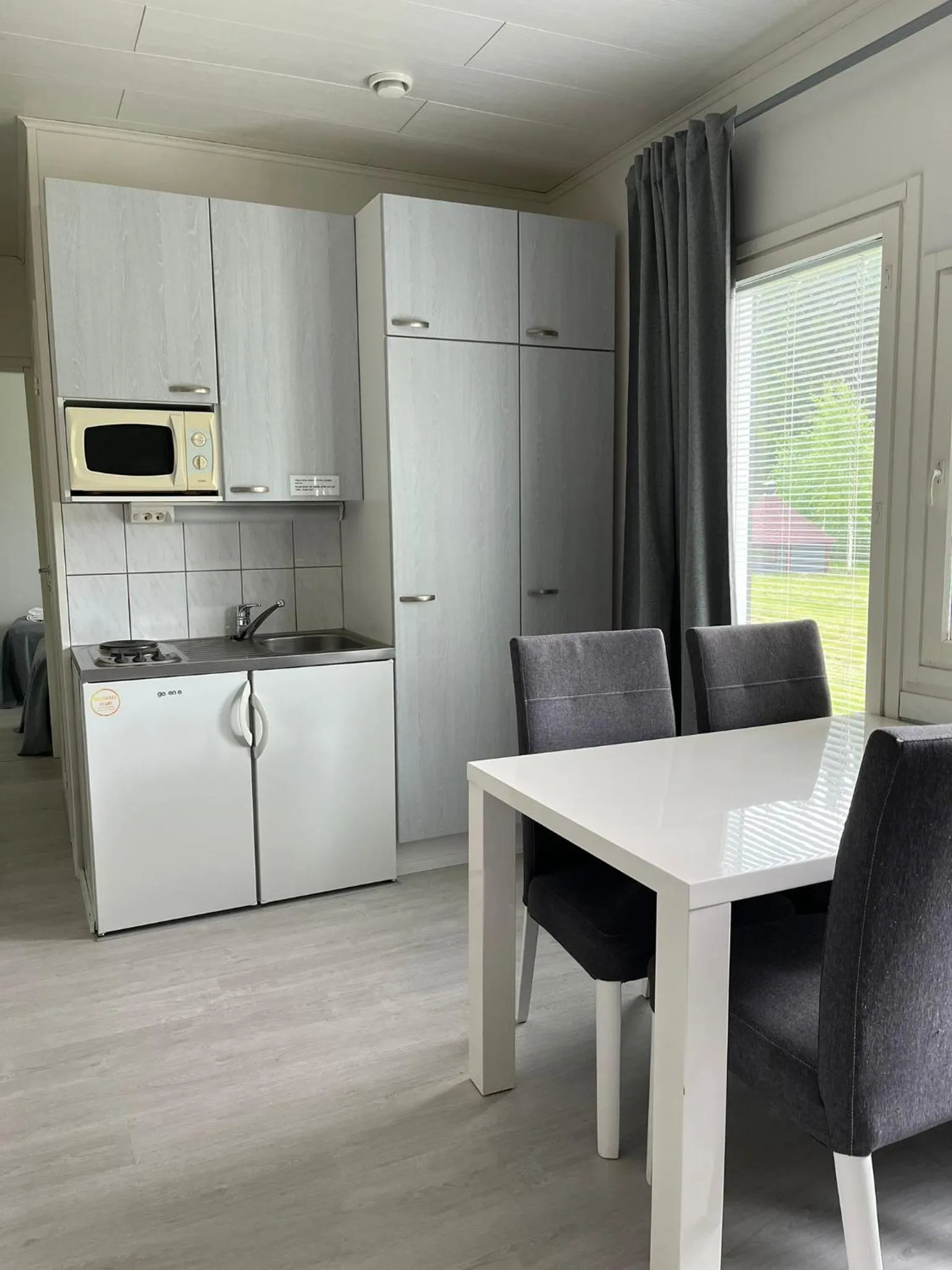 Kitchen or kitchenette in Hotelli Kontio